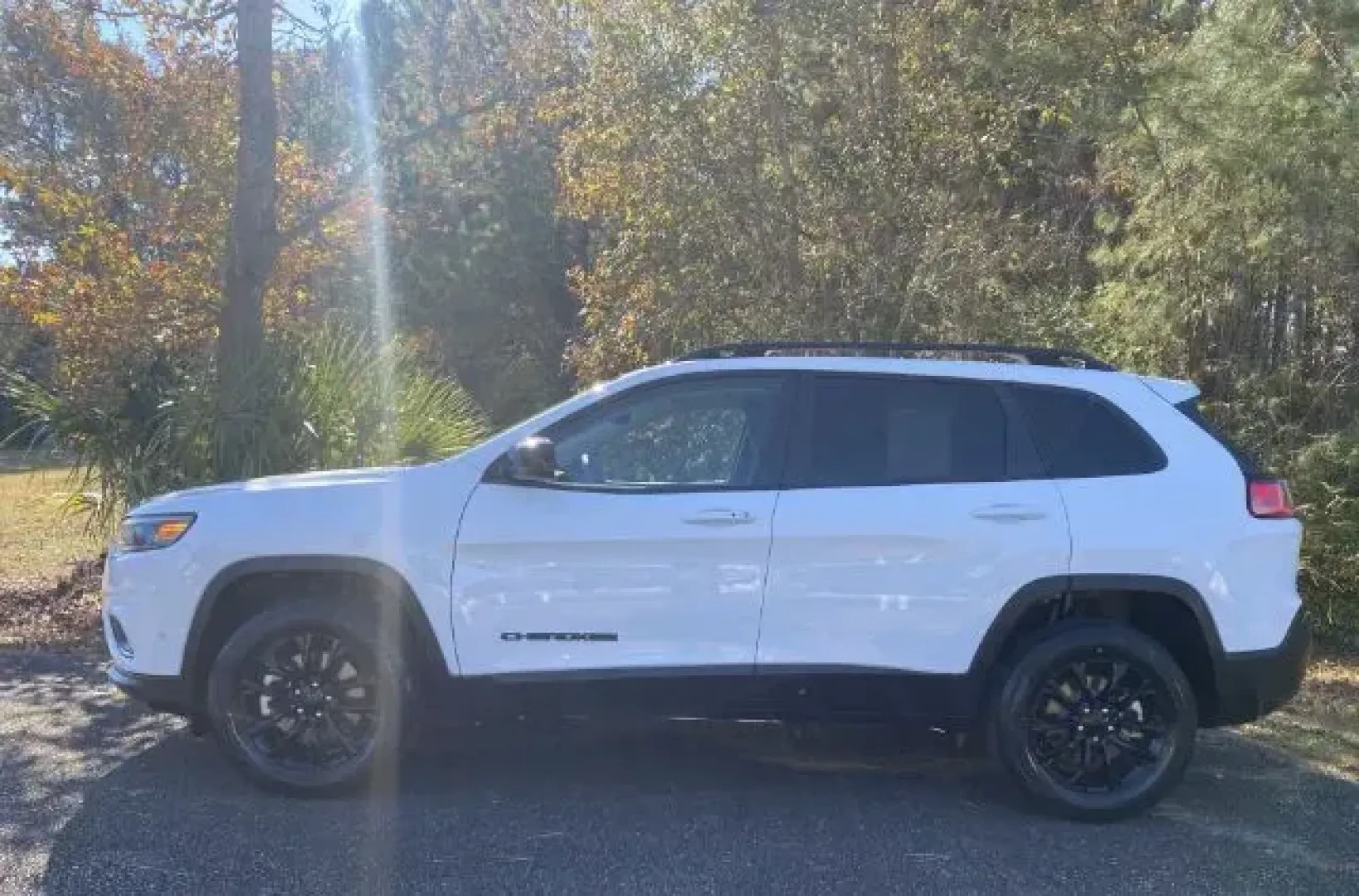 2023 /Black Jeep Cherokee Latitude Lux 4WD (1C4PJMMB7PD) with an 2.4L L4 DOHC 16V engine, 9-Speed Automatic transmission, located at 3598 James B White Hwy South, Whiteville, NC, 28472, (910) 642-3196, 34.294846, -78.732613 - 2023 Jeep Cherokee Latitude Lux 4WD - Photo#2