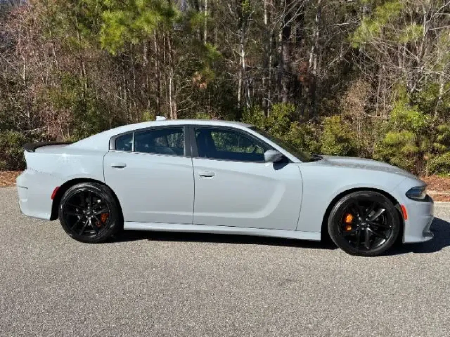 2022 /Black Dodge Charger GT (2C3CDXHG9NH) with an 3.6L V6 DOHC 24V engine, 8-Speed Automatic transmission, located at 3598 James B White Hwy South, Whiteville, NC, 28472, (910) 642-3196, 34.294846, -78.732613 - 2022 Dodge Charger GT - Photo#2