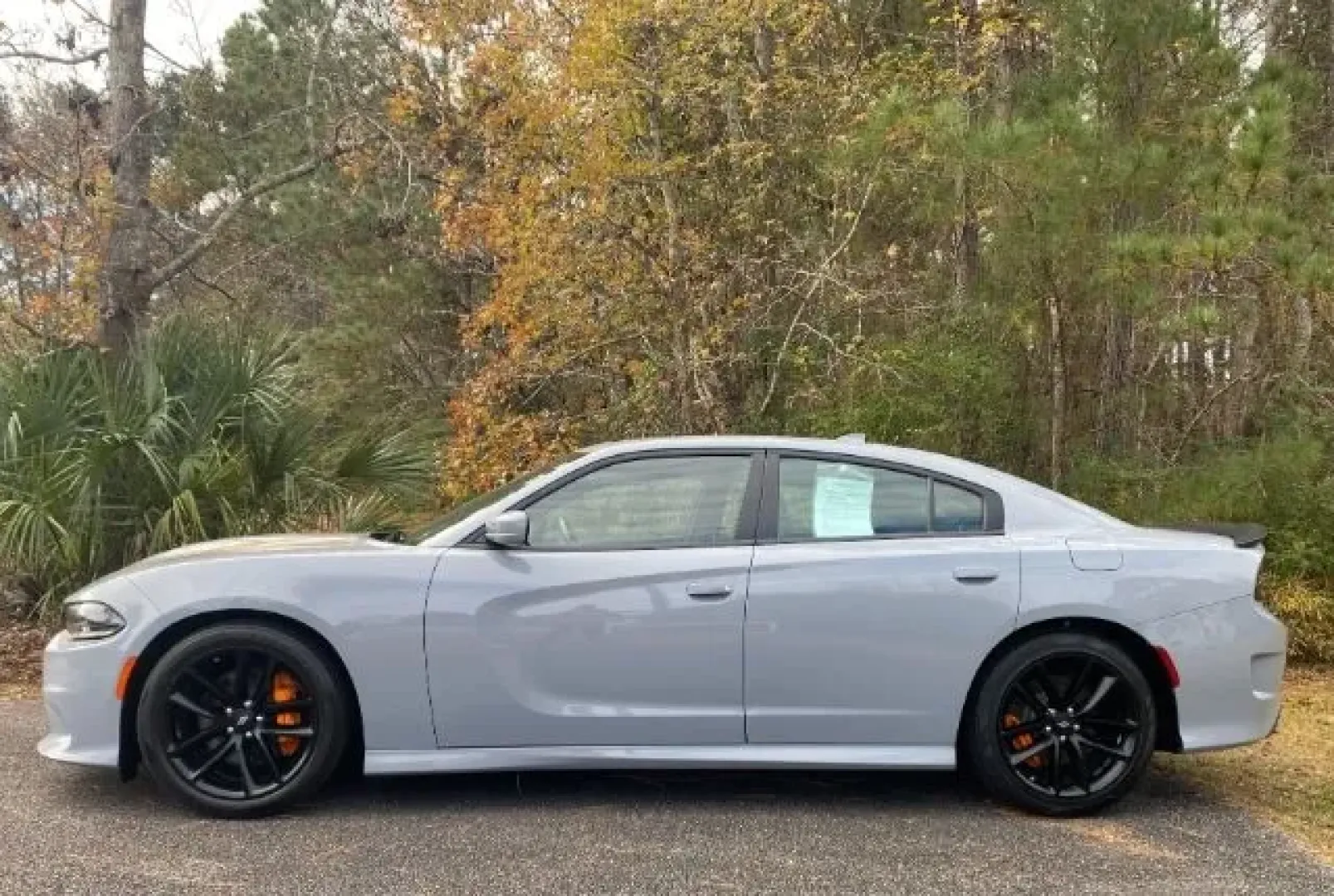 2022 /Black Dodge Charger GT (2C3CDXHG9NH) with an 3.6L V6 DOHC 24V engine, 8-Speed Automatic transmission, located at 9146 Ocean Hwy West, Calabash, NC, 28467, (910) 579-1110, 33.928635, -78.576157 - Experience the thrill of the open road with this stunning 2022 Dodge Charger GT, available now at Car City - Whitesville, your trusted pre-owned dealership located at 3598 James B White Hwy South, Whiteville, NC 28472. Whether you're commuting to work or embarking on weekend adventures, this vehicle - Photo#1