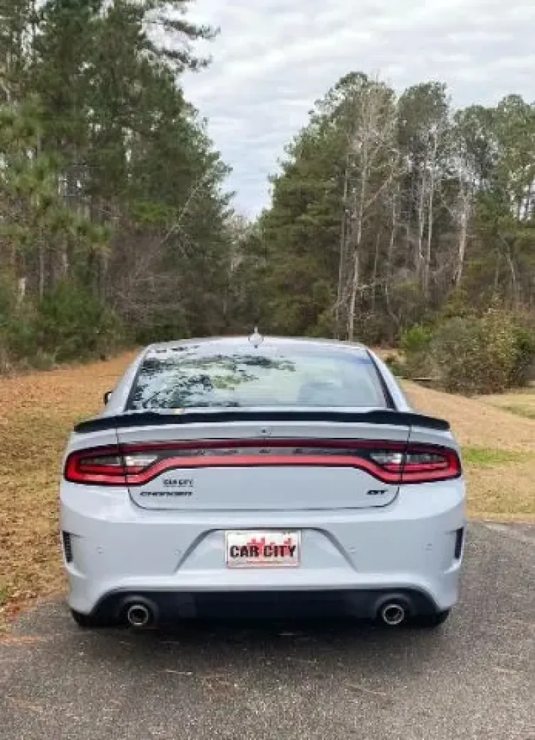 2022 /Black Dodge Charger GT (2C3CDXHG9NH) with an 3.6L V6 DOHC 24V engine, 8-Speed Automatic transmission, located at 9146 Ocean Hwy West, Calabash, NC, 28467, (910) 579-1110, 33.928635, -78.576157 - Experience the thrill of the open road with this stunning 2022 Dodge Charger GT, available now at Car City - Whitesville, your trusted pre-owned dealership located at 3598 James B White Hwy South, Whiteville, NC 28472. Whether you're commuting to work or embarking on weekend adventures, this vehicle - Photo#3