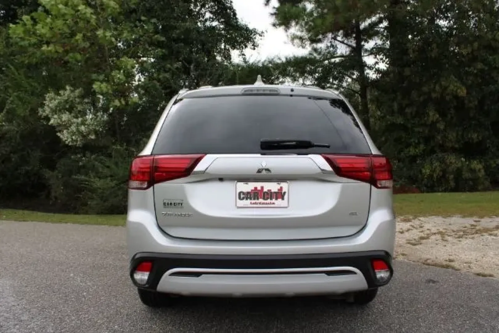 2020 /Black, leather Mitsubishi Outlander SEL 2WD (JA4AD3A33LZ) with an 2.4L L4 DOHC 16V engine, Continuously Variabl transmission, located at 3598 James B White Hwy South, Whiteville, NC, 28472, (910) 642-3196, 34.294846, -78.732613 - Are you in search of the perfect SUV to elevate your lifestyle and tackle everyday adventures? Look no further than the 2020 Mitsubishi Outlander SEL 2WD, available now at Car City - Whitesville. Whether you're commuting to work, running errands, or taking the family on weekend road trips, this vers - Photo#2
