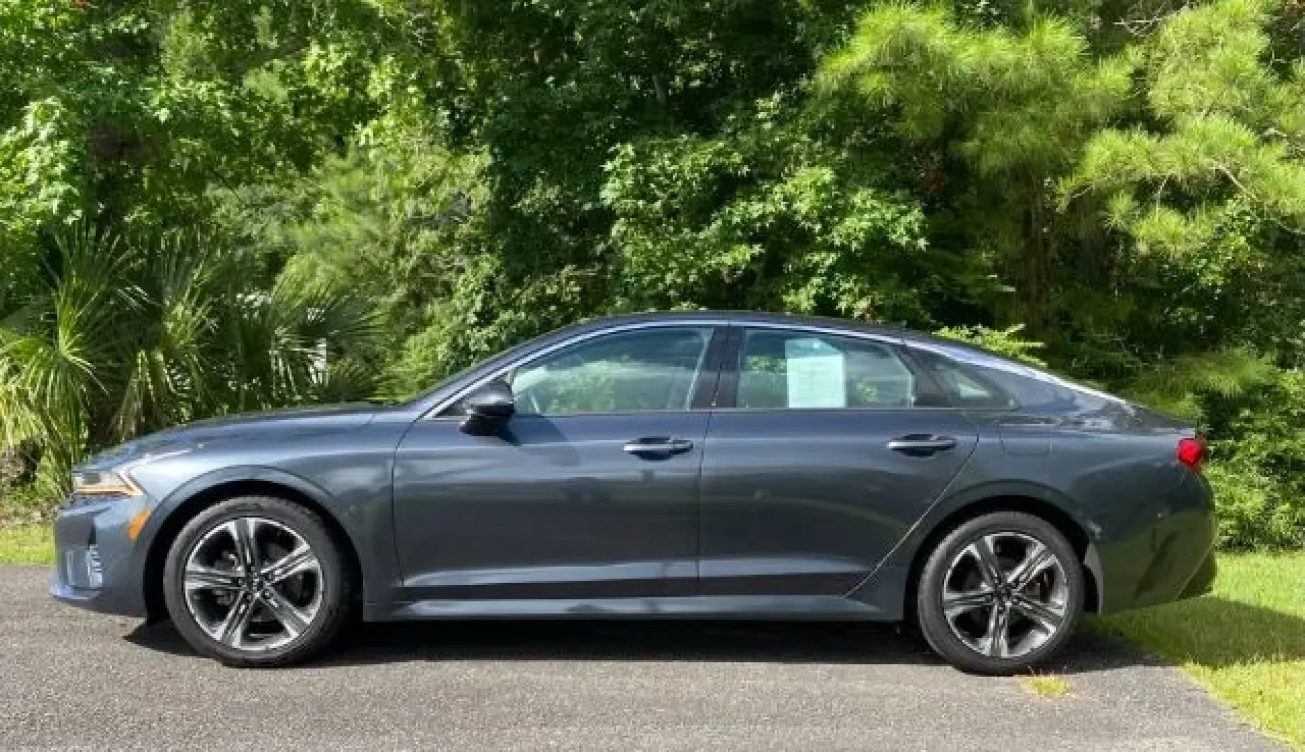 2021 Kia K5 EX (5XXG34J20MG) with an 1.6L L4 DOHC 16V engine, 8-Speed Automatic transmission, located at 9146 Ocean Hwy West, Calabash, NC, 28467, (910) 579-1110, 33.928635, -78.576157 - **Elevate Your Daily Commute with the 2021 Kia K5 EX A Sedan Built for Life's Journeys!**<br /> <br /> Are you ready to transform your daily commute or weekend getaways into a stylish and comfortable experience? The 2021 Kia K5 EX is the perfect solution for anyone looking for a blend of practicali - Photo#1