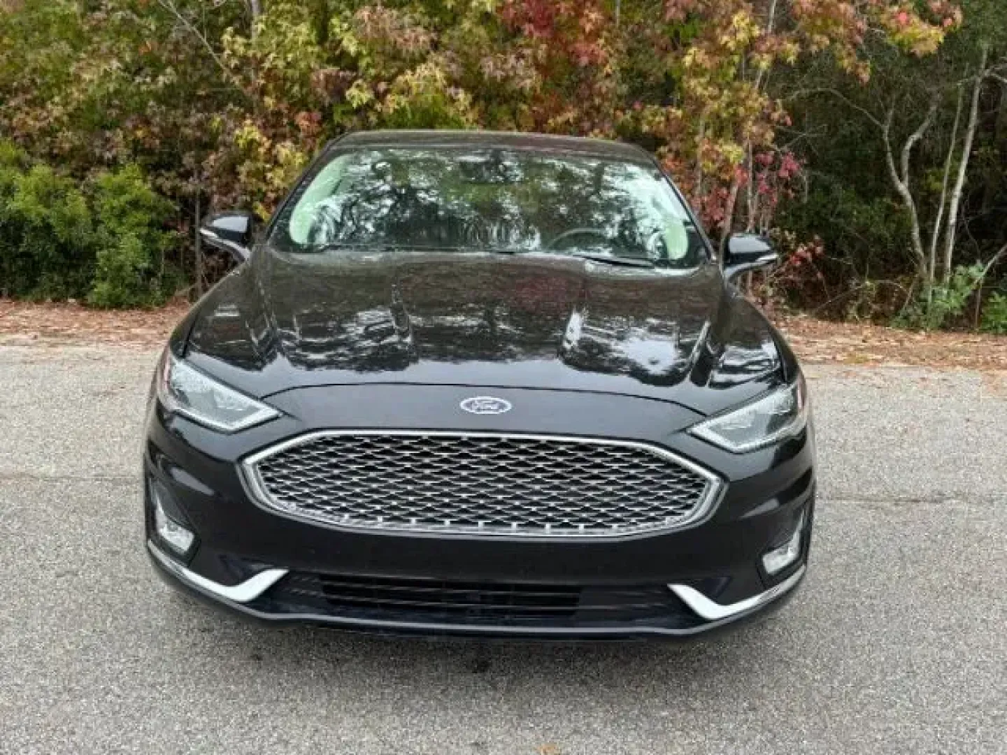 2020 /Ebony, leather Ford Fusion Titanium AWD (3FA6P0D99LR) with an 2.0L L4 DOHC 16V engine, 6-Speed Automatic transmission, located at 9146 Ocean Hwy West, Calabash, NC, 28467, (910) 579-1110, 33.928635, -78.576157 - 2020 Ford Fusion Titanium AWD - Photo#3