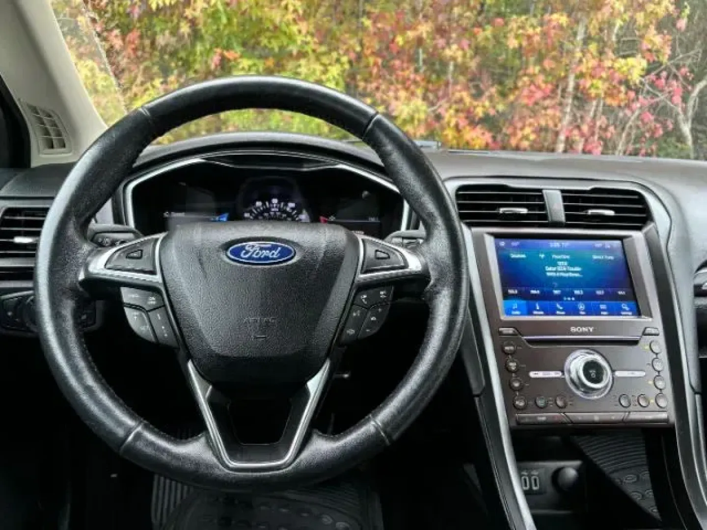 2020 /Ebony, leather Ford Fusion Titanium AWD (3FA6P0D99LR) with an 2.0L L4 DOHC 16V engine, 6-Speed Automatic transmission, located at 9146 Ocean Hwy West, Calabash, NC, 28467, (910) 579-1110, 33.928635, -78.576157 - 2020 Ford Fusion Titanium AWD - Photo#6