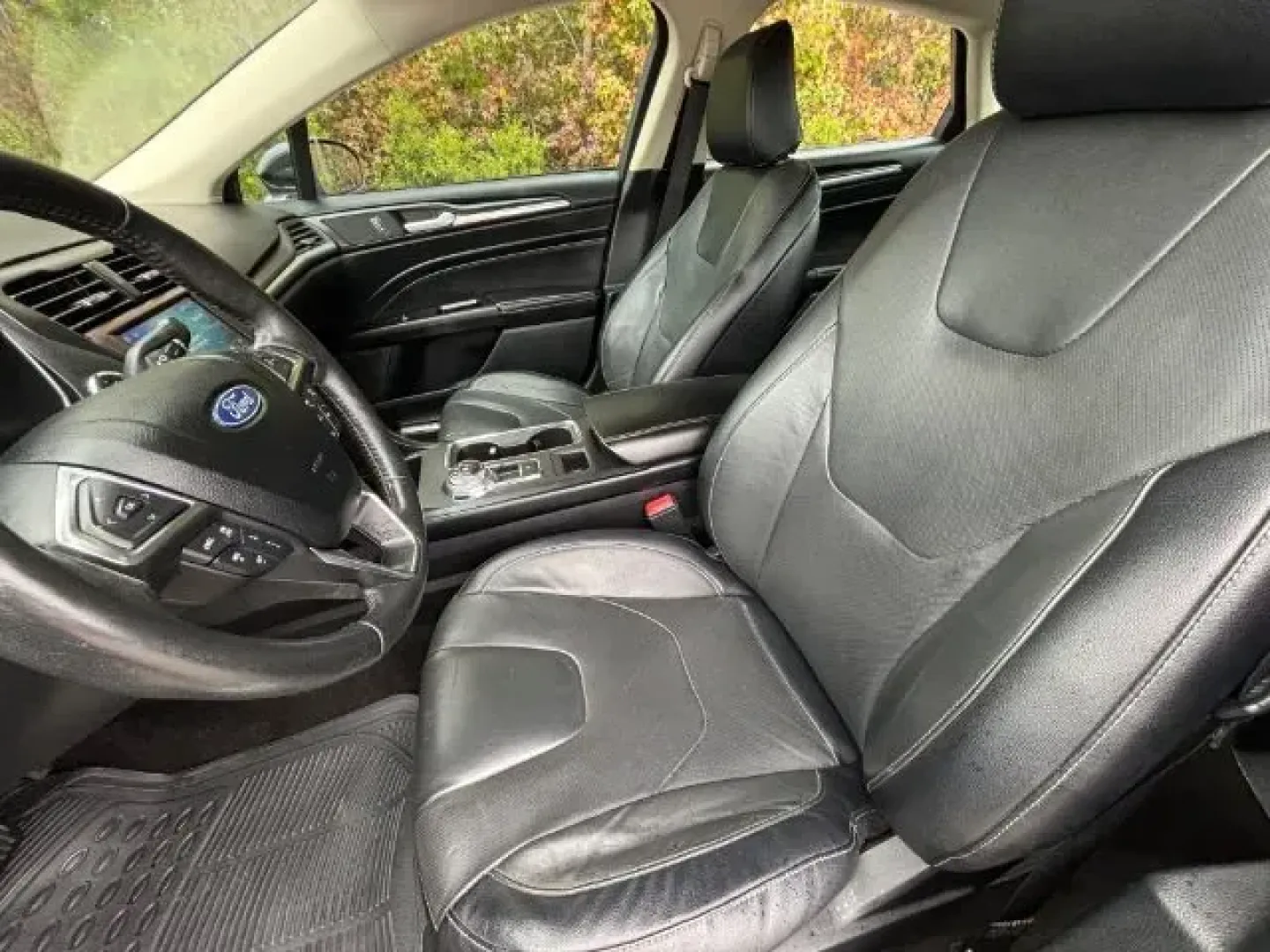 2020 /Ebony, leather Ford Fusion Titanium AWD (3FA6P0D99LR) with an 2.0L L4 DOHC 16V engine, 6-Speed Automatic transmission, located at 9146 Ocean Hwy West, Calabash, NC, 28467, (910) 579-1110, 33.928635, -78.576157 - 2020 Ford Fusion Titanium AWD - Photo#7