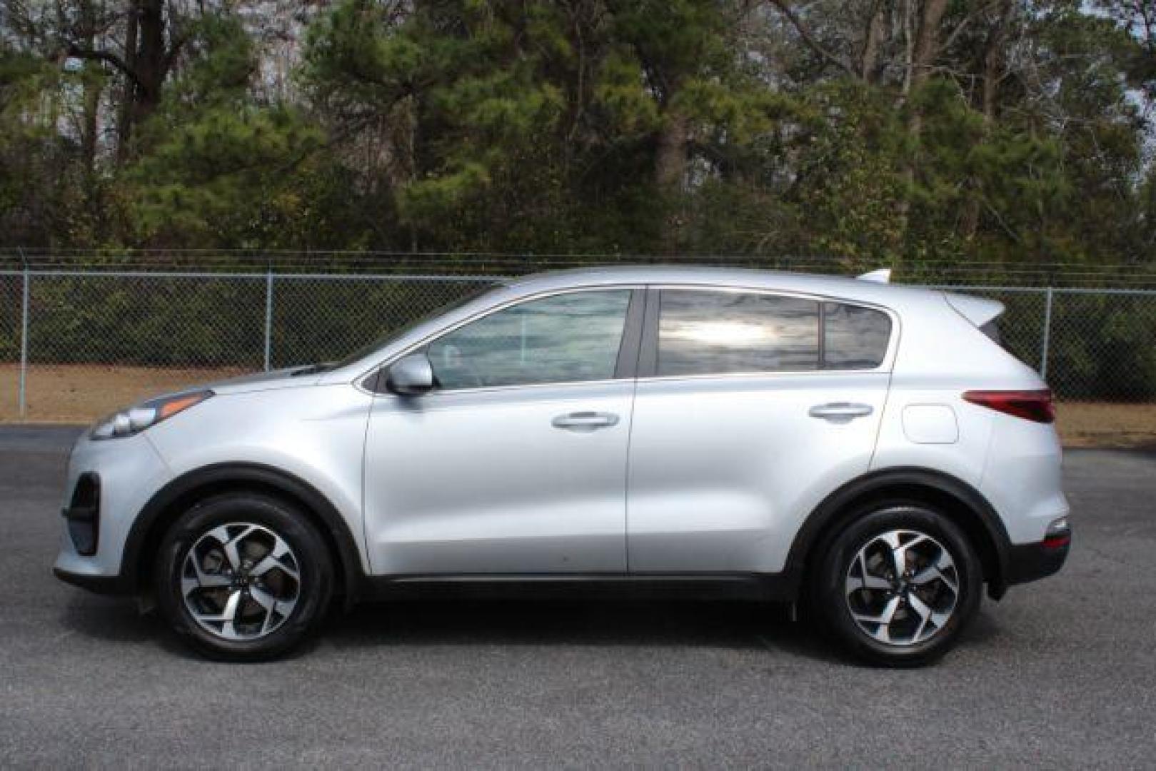 2021 Kia Sportage LX FWD (KNDPM3AC2M7) with an 2.4L V6 DOHC 24V engine, 6-Speed Automatic transmission, located at 9146 Ocean Hwy West, Calabash, NC, 28467, (910) 579-1110, 33.928635, -78.576157 - 2021 Kia Sportage LX FWD - Photo#4