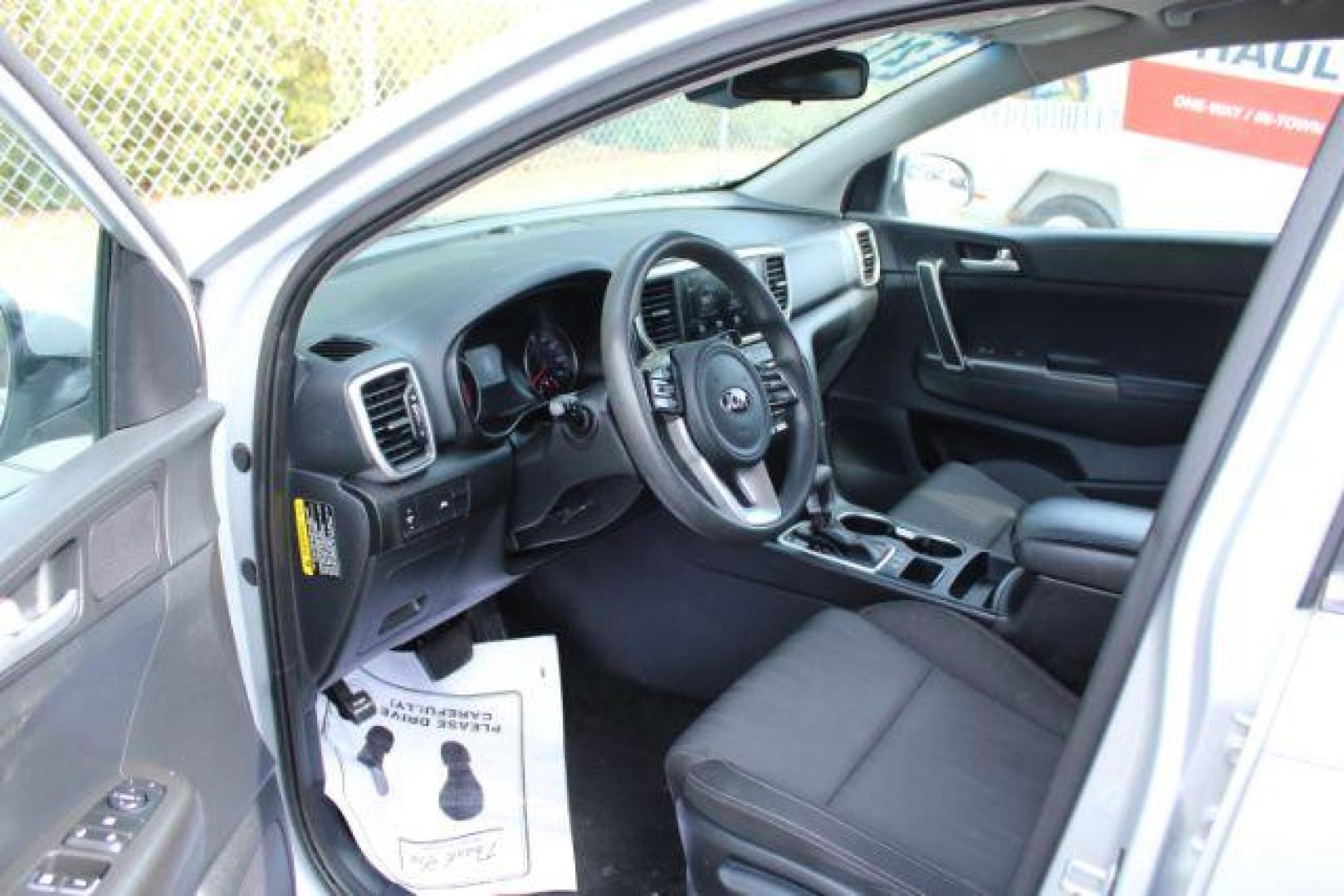 2021 Kia Sportage LX FWD (KNDPM3AC2M7) with an 2.4L V6 DOHC 24V engine, 6-Speed Automatic transmission, located at 9146 Ocean Hwy West, Calabash, NC, 28467, (910) 579-1110, 33.928635, -78.576157 - 2021 Kia Sportage LX FWD - Photo#6