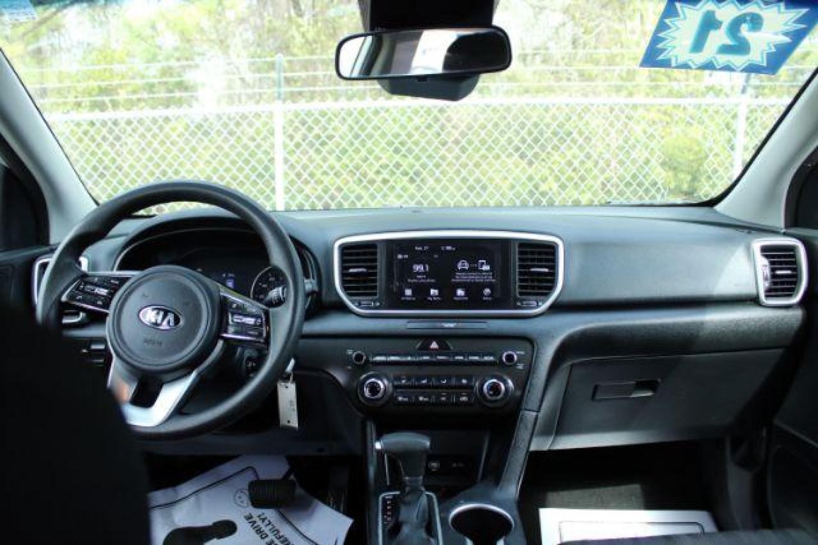 2021 Kia Sportage LX FWD (KNDPM3AC2M7) with an 2.4L V6 DOHC 24V engine, 6-Speed Automatic transmission, located at 9146 Ocean Hwy West, Calabash, NC, 28467, (910) 579-1110, 33.928635, -78.576157 - 2021 Kia Sportage LX FWD - Photo#8