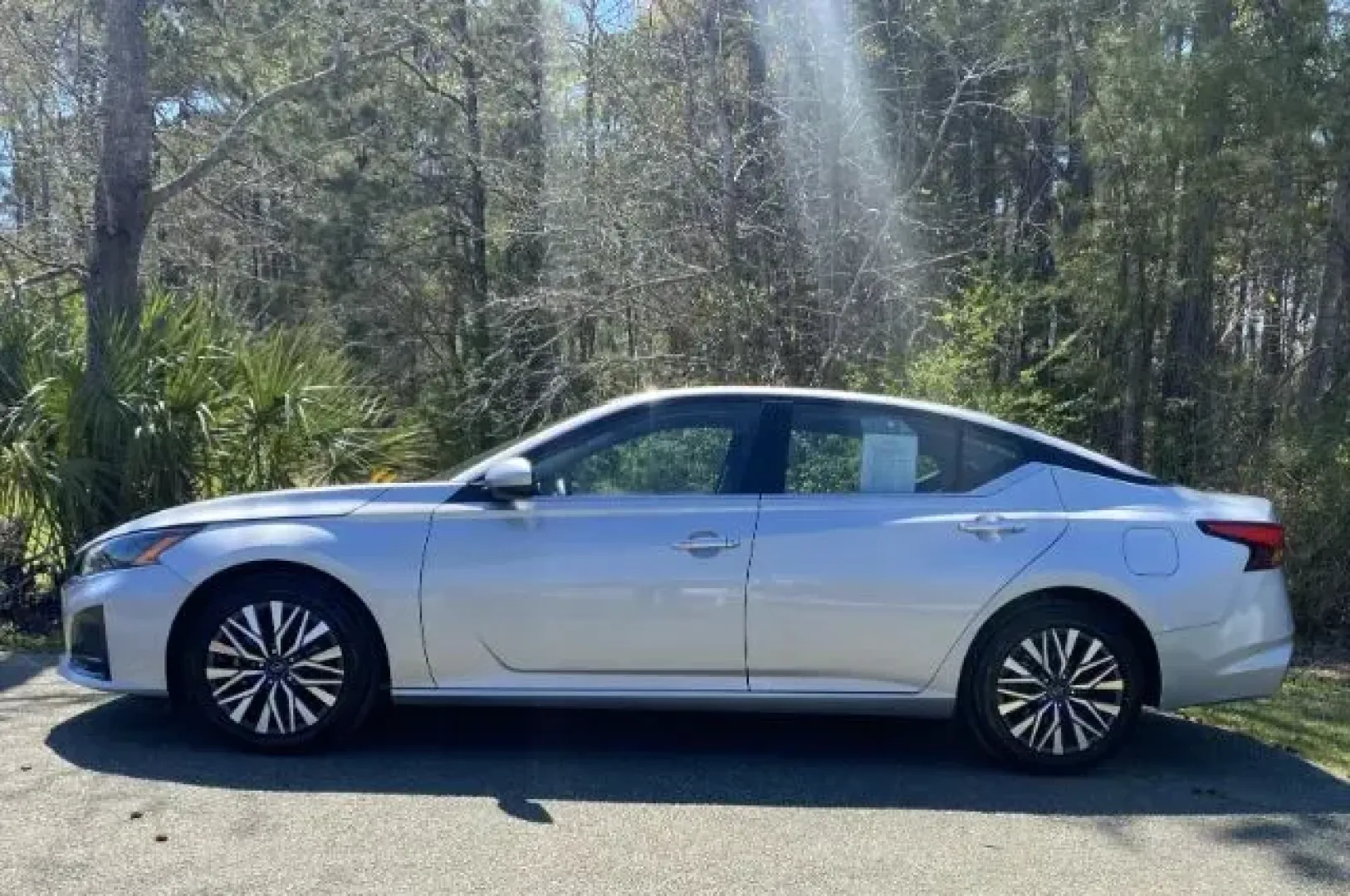 2023 /Charcoal Nissan Altima SV FWD (1N4BL4DV1PN) with an 2.5L I-4 gasoline direct injection engine, located at 3598 James B White Hwy South, Whiteville, NC, 28472, (910) 642-3196, 34.294846, -78.732613 - 2023 Nissan Altima SV FWD - Photo#2