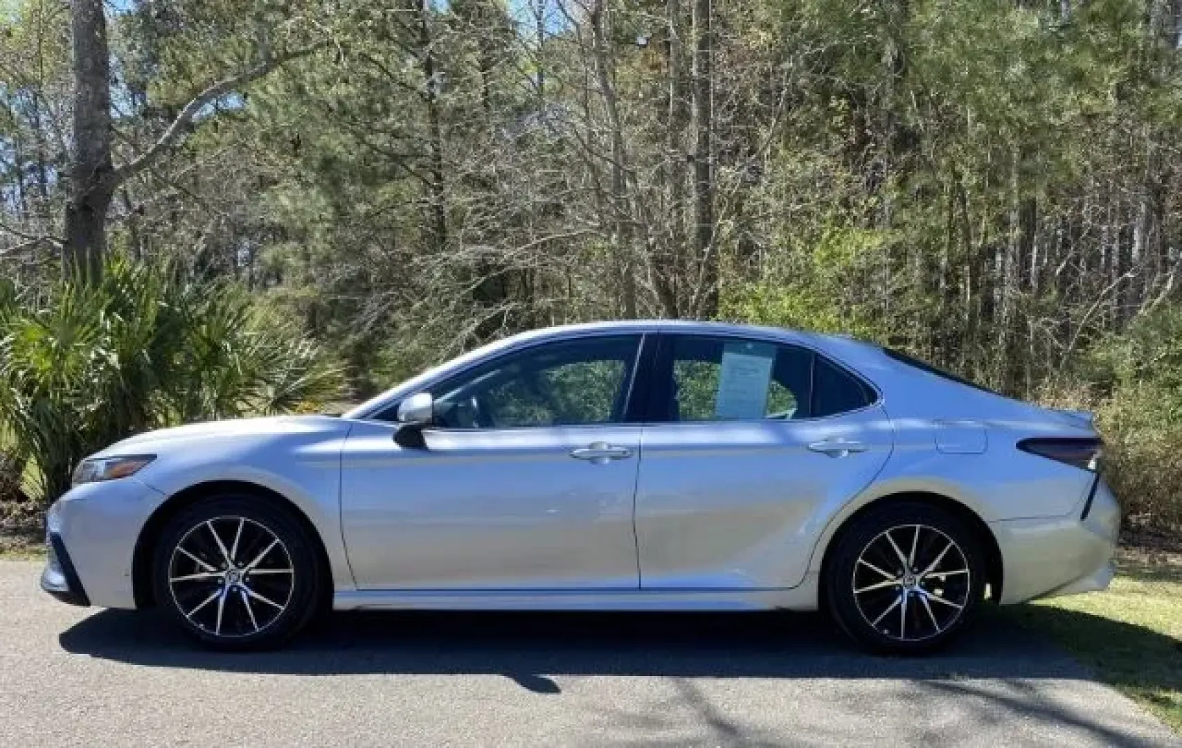 2023 /Black Toyota Camry SE (4T1G11AK0PU) with an 2.5L I-4 port/direct injection engine, located at 9146 Ocean Hwy West, Calabash, NC, 28467, (910) 579-1110, 33.928635, -78.576157 - Are you in search of a reliable sedan that combines comfort, efficiency, and style? Look no further than this stunning 2023 Toyota Camry SE available at Car City - Calabash! Perfect for daily commuters, growing families, or anyone who appreciates a smooth ride, this pre-owned sedan has everything yo - Photo#1