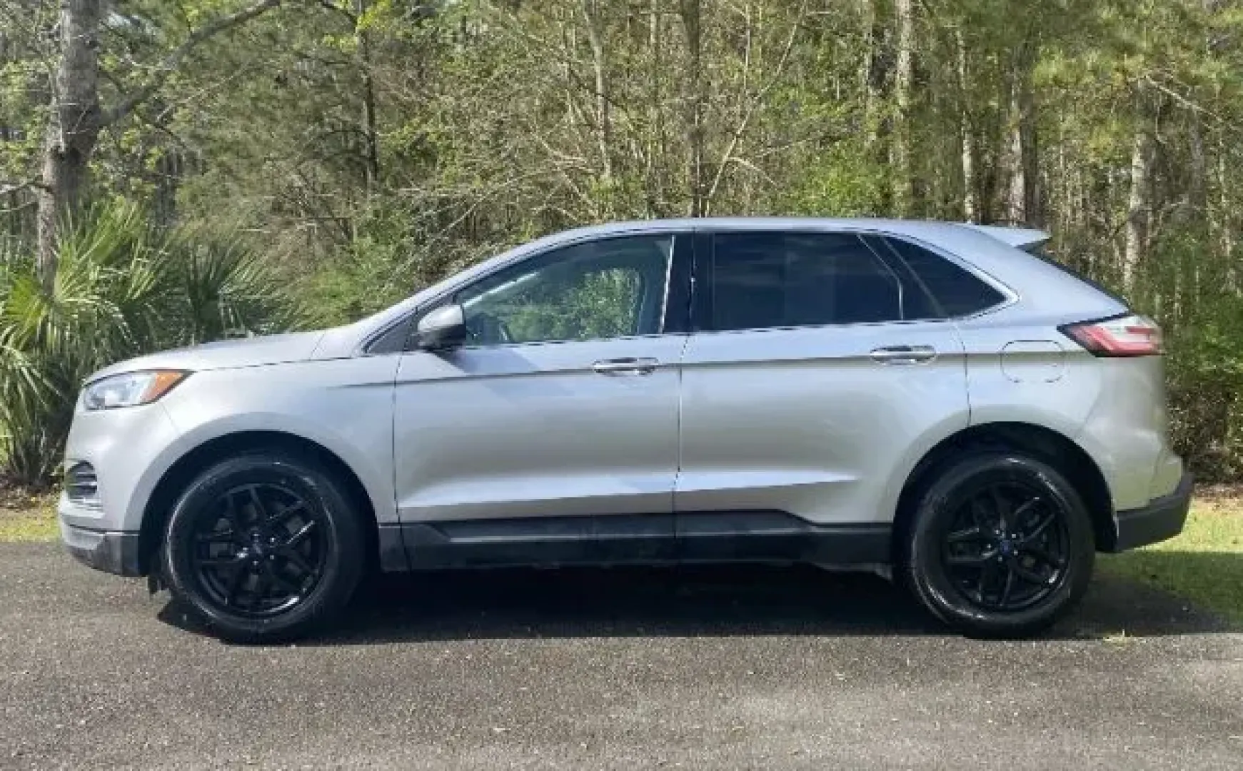 2022 /Ebony Ford Edge SEL AWD (2FMPK4J95NB) with an 2.0L L4 DOHC 16V engine, 6-Speed Automatic transmission, located at 9146 Ocean Hwy West, Calabash, NC, 28467, (910) 579-1110, 33.928635, -78.576157 - 2022 Ford Edge SEL AWD - Photo#2