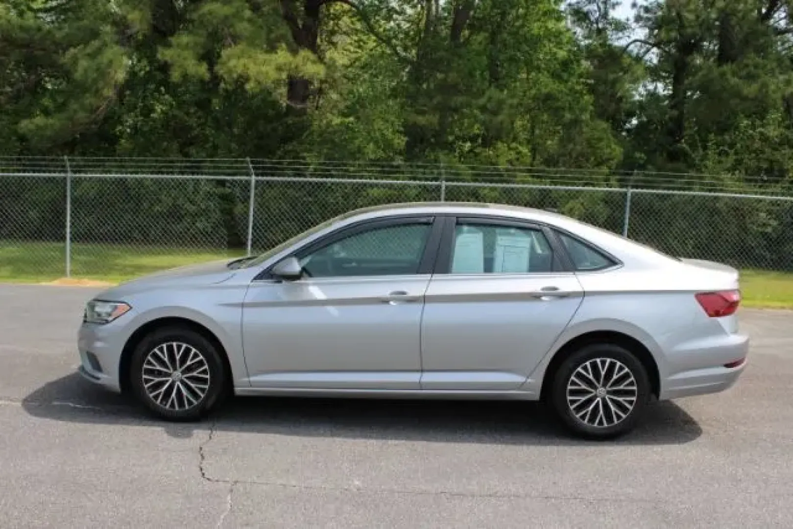 2021 Volkswagen Jetta 1.4T SE 8A (3VWC57BU8MM) with an 1.4L L4 DOHC 16V engine, 8-Speed Automatic transmission, located at 9146 Ocean Hwy West, Calabash, NC, 28467, (910) 579-1110, 33.928635, -78.576157 - Looking for a vehicle that seamlessly fits into your dynamic lifestyle? Whether you're a commuter navigating the bustling streets of Whiteville, NC, or a growing family seeking a spacious and comfortable ride, the 2021 Volkswagen Jetta is the perfect match. With its blend of style, efficiency, and a - Photo#3
