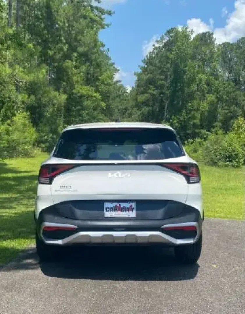 2023 /Black Kia Sportage LX (KNDPU3AF1P7) with an 2.5L I-4 port/direct injection engine, located at 9146 Ocean Hwy West, Calabash, NC, 28467, (910) 579-1110, 33.928635, -78.576157 - **Explore the Open Road with the 2023 Kia Sportage LX at Car City - Calabash!**<br /> <br /> Imagine cruising through the picturesque coastal roads of Calabash, NC, with the wind in your hair and the sun shining down on your new 2023 Kia Sportage LX. This stunning crossover is not just a vehicle; it - Photo#3