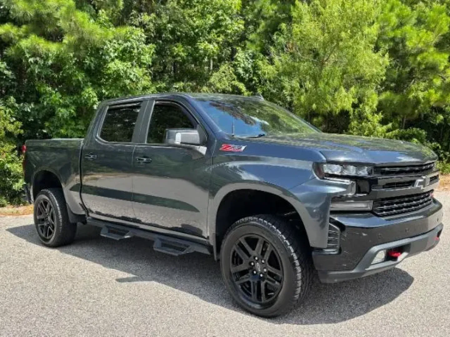 2021 /Jet Black, leather Chevrolet Silverado 1500 LT Trail Boss Crew Cab 4WD (1GCPYFEL0MZ) with an 6.2L V8 OHV 16V engine, 6-Speed Automatic transmission, located at 2761 East Hwy 501, Conway, SC, 29526, (843) 331-1151, 33.781528, -78.989883 - **Unleash Adventure with the 2021 Chevrolet Silverado 1500 LT Trail Boss at Car City - Calabash!**<br /> <br /> Are you ready to take your weekends off-road, tackle tough job sites, or simply enjoy the thrill of the open road? The 2021 Chevrolet Silverado 1500 LT Trail Boss Crew Cab 4WD is the ideal - Photo#1