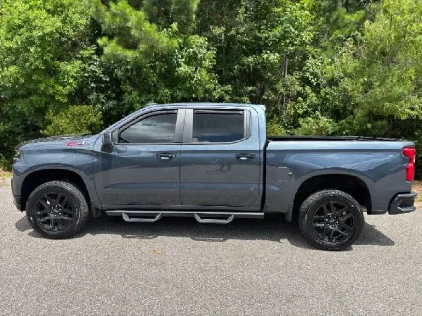 2021 /Jet Black, leather Chevrolet Silverado 1500 LT Trail Boss Crew Cab 4WD (1GCPYFEL0MZ) with an 6.2L V8 OHV 16V engine, 6-Speed Automatic transmission, located at 2761 East Hwy 501, Conway, SC, 29526, (843) 331-1151, 33.781528, -78.989883 - **Unleash Adventure with the 2021 Chevrolet Silverado 1500 LT Trail Boss at Car City - Calabash!**<br /> <br /> Are you ready to take your weekends off-road, tackle tough job sites, or simply enjoy the thrill of the open road? The 2021 Chevrolet Silverado 1500 LT Trail Boss Crew Cab 4WD is the ideal - Photo#2