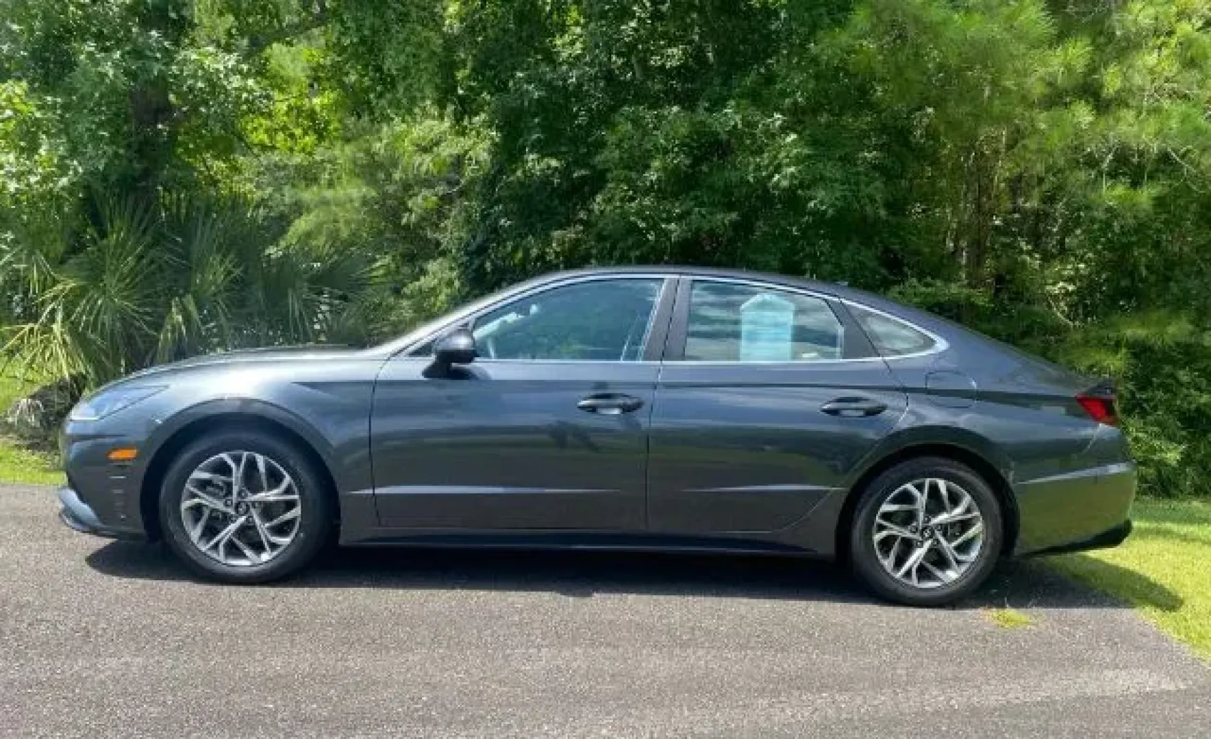 2023 /Dark Gray Hyundai Sonata SEL (KMHL64JA7PA) with an Smartstream 2.5L I-4 port/direct injection engine, located at 9146 Ocean Hwy West, Calabash, NC, 28467, (910) 579-1110, 33.928635, -78.576157 - **Experience Comfort and Style with the 2023 Hyundai Sonata SEL at Car City - Calabash!**<br /> <br /> Are you looking for a vehicle that seamlessly blends comfort, style, and advanced technology for your daily commutes or weekend adventures? Look no further than this stunning 2023 Hyundai Sonata SE - Photo#1