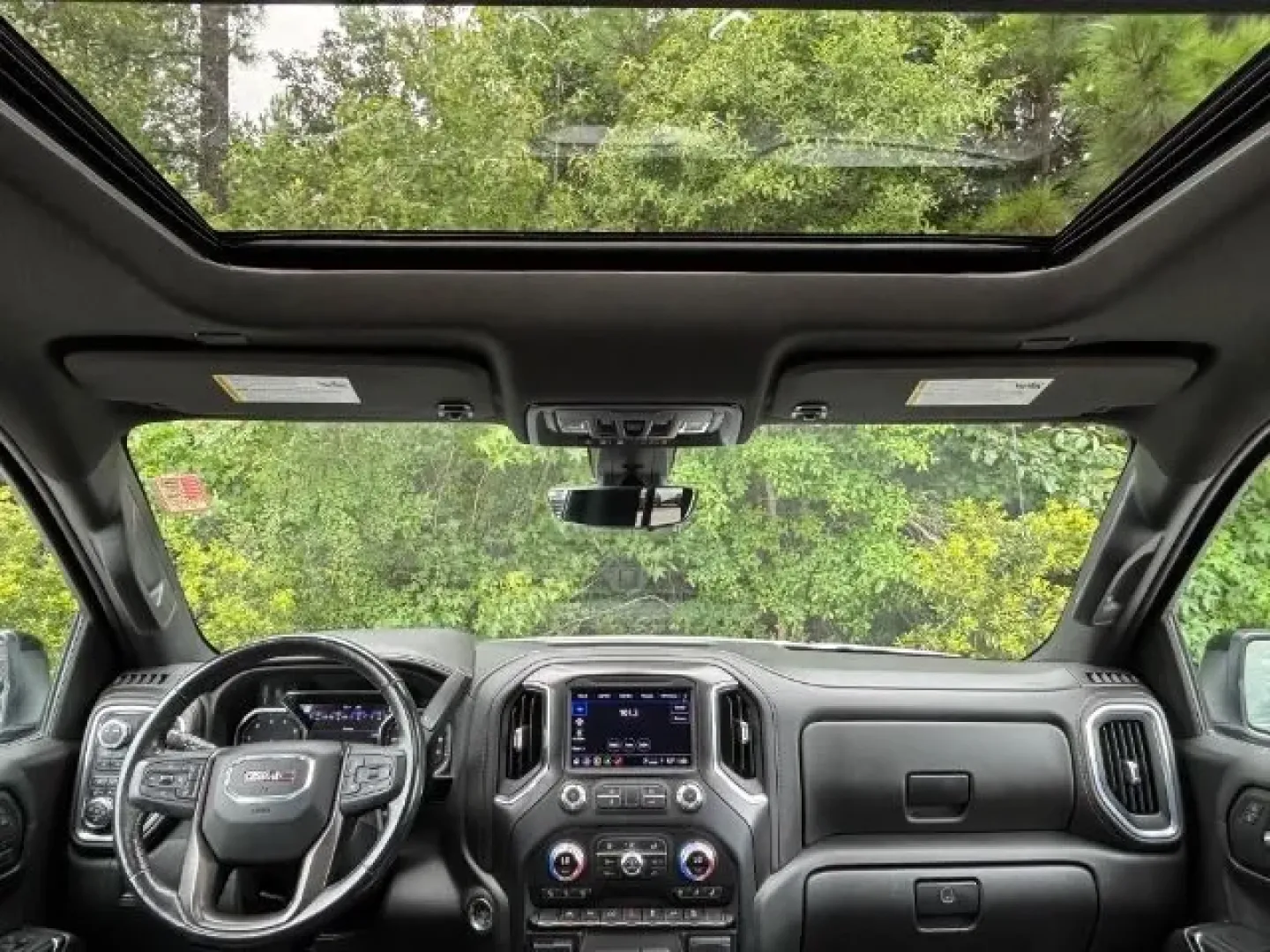 2022 /Jet Black w/Kalahari Accents GMC Sierra 1500 Limited 4WD Crew Cab Short Box AT4 (3GTP9EEL5NG) with an EcoTec3 6.2L V-8 gasoline direct injection engine, located at 9146 Ocean Hwy West, Calabash, NC, 28467, (910) 579-1110, 33.928635, -78.576157 - **Discover Adventure with the 2022 GMC Sierra 1500 Limited AT4 Your Perfect All-Season Pickup**<br /> <br /> Are you ready to elevate your driving experience? Whether you're hauling gear for weekend adventures, navigating daily commutes, or accommodating your growing family, the 2022 GMC Sierra 150 - Photo#9
