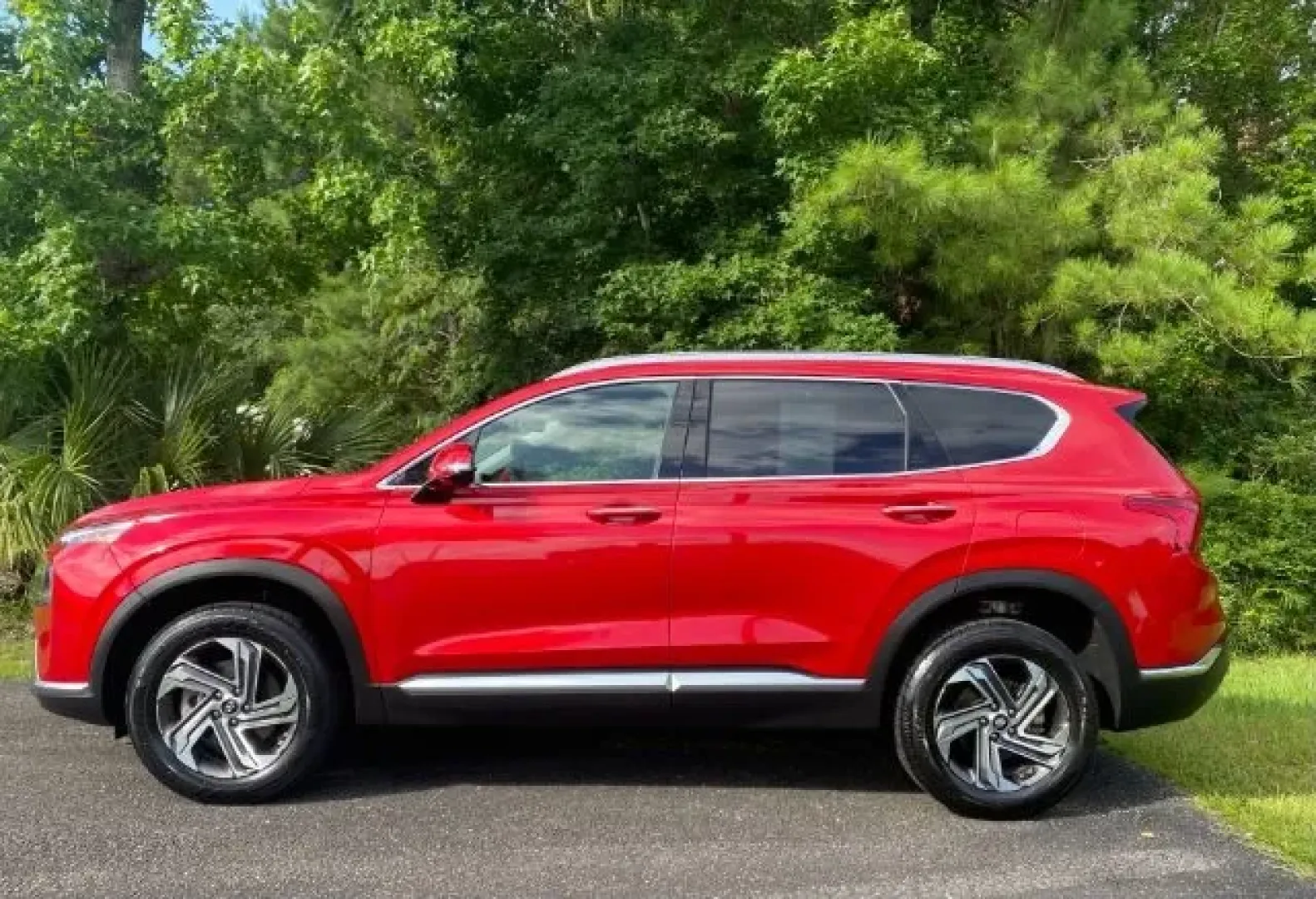 2023 /Black Hyundai Santa Fe SEL (5NMS3DAJ9PH) with an Smartstream 2.5L I-4 port/direct injection engine, located at 9146 Ocean Hwy West, Calabash, NC, 28467, (910) 579-1110, 33.928635, -78.576157 - Explore the open road with the 2023 Hyundai Santa Fe SEL, a versatile SUV that seamlessly blends comfort, functionality, and style. Whether you're embarking on a family road trip, commuting to work, or enjoying weekend adventures, this vehicle is designed for all of life's journeys. As a premier pre - Photo#1