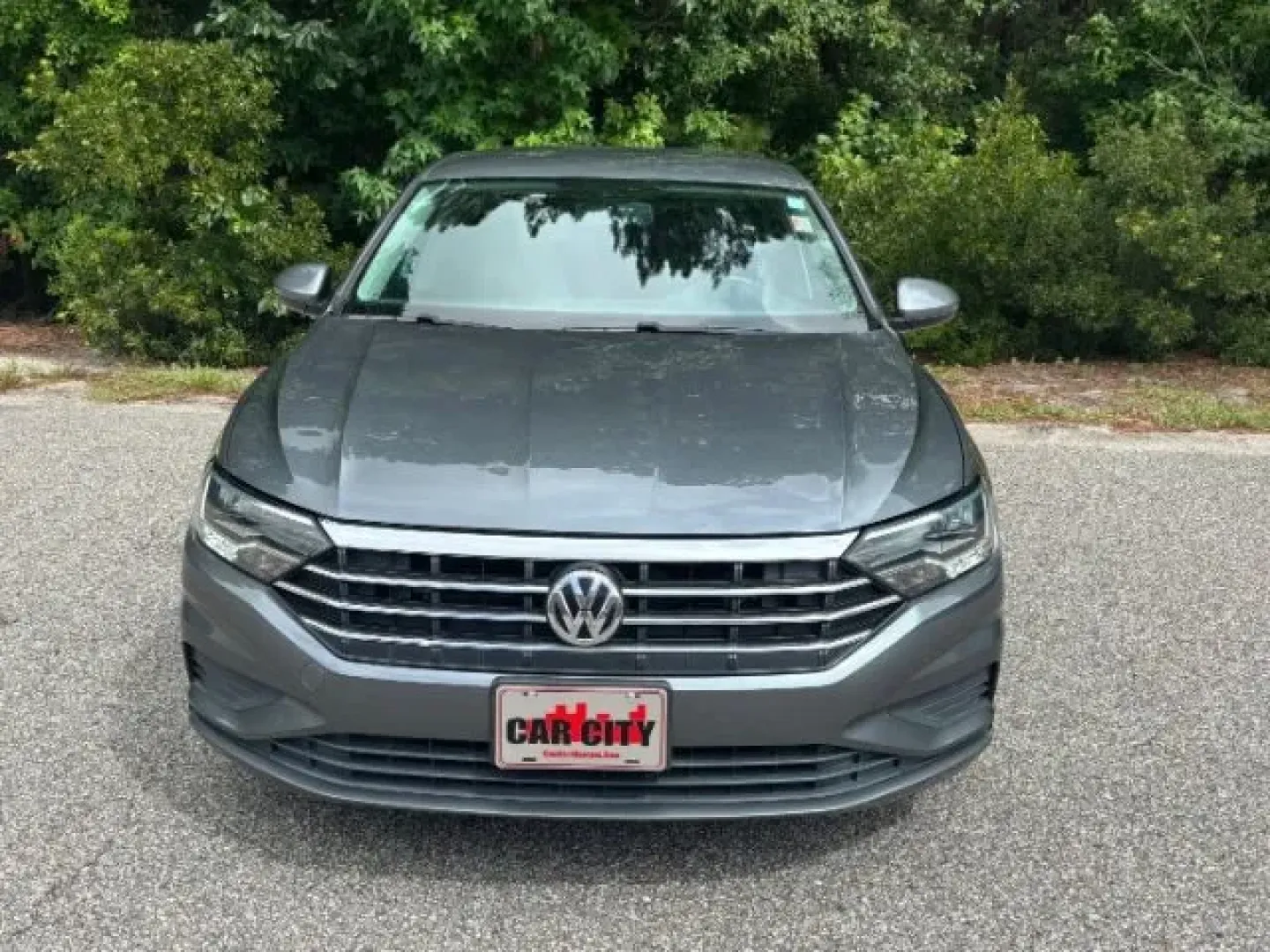 2019 /Titan Black, cloth Volkswagen Jetta 1.4T S 8A (3VWC57BU7KM) with an 1.4L L4 DOHC 16V engine, 8-Speed Automatic transmission, located at 2761 East Hwy 501, Conway, SC, 29526, (843) 331-1151, 33.781528, -78.989883 - Are you seeking an affordable yet stylish sedan that can effortlessly glide through your daily commute while also accommodating weekend adventures? Look no further than this impressive 2019 Volkswagen Jetta, now available at Car City - Conway. Located conveniently in Conway, SC, at 2761 East Hwy 501 - Photo#4