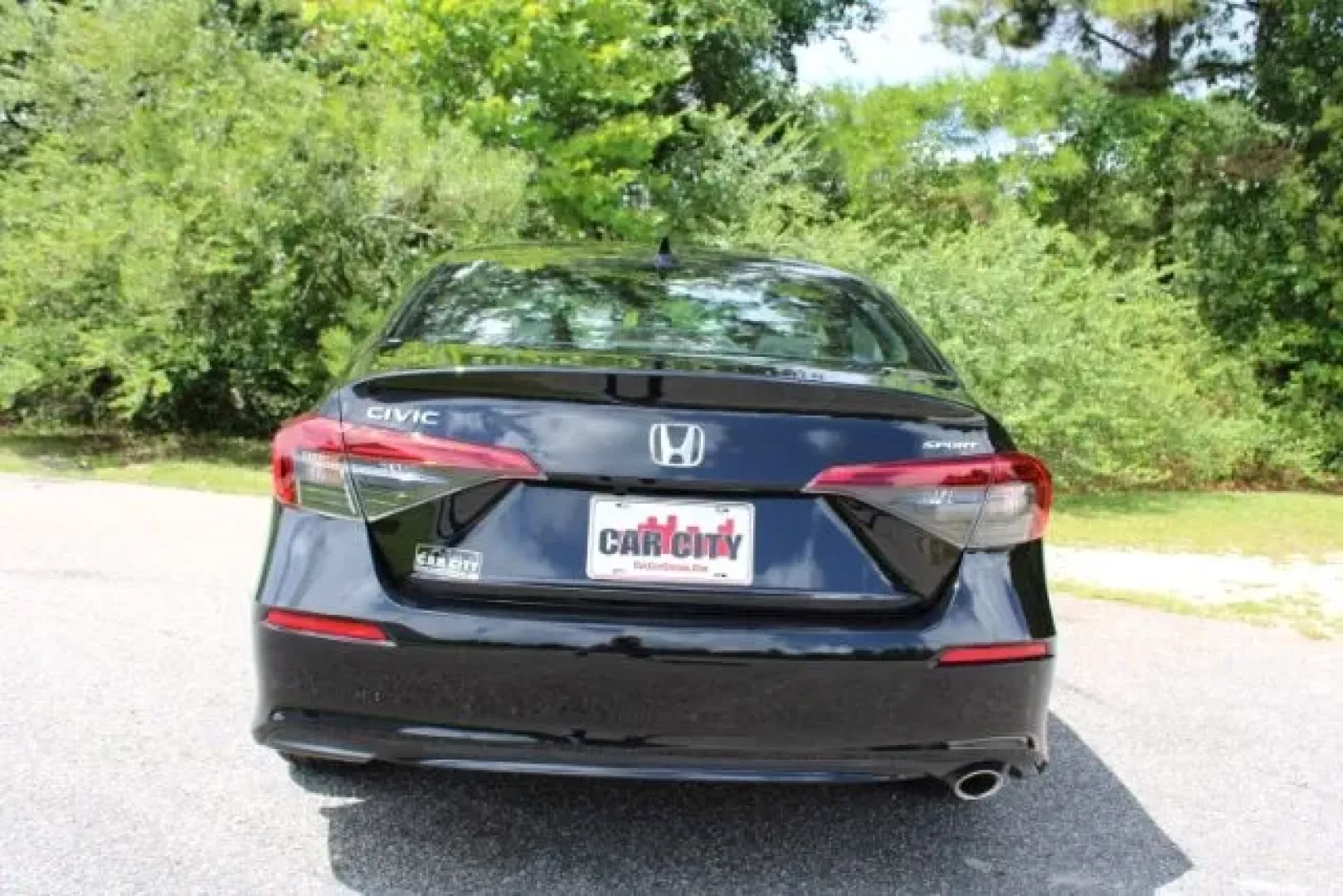 2022 Honda Civic Sport Sedan (2HGFE2F54NH) with an 2L I-4 gasoline direct injection engine, located at 3598 James B White Hwy South, Whiteville, NC, 28472, (910) 642-3196, 34.294846, -78.732613 - **Elevate Your Daily Drive with This 2022 Honda Civic Sport Sedan!**<br /> <br /> Looking for a vehicle that can keep up with your busy lifestyle? The 2022 Honda Civic Sport Sedan is the perfect companion for those who value reliability, comfort, and performance. Whether you're commuting to work, ru - Photo#2
