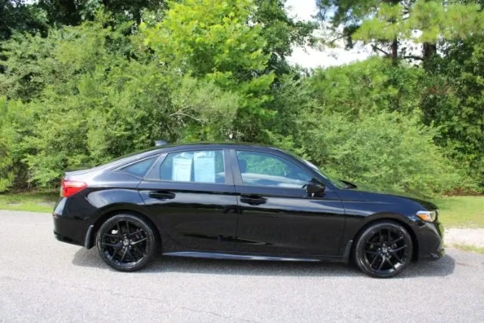 2022 Honda Civic Sport Sedan (2HGFE2F54NH) with an 2L I-4 gasoline direct injection engine, located at 3598 James B White Hwy South, Whiteville, NC, 28472, (910) 642-3196, 34.294846, -78.732613 - **Elevate Your Daily Drive with This 2022 Honda Civic Sport Sedan!**<br /> <br /> Looking for a vehicle that can keep up with your busy lifestyle? The 2022 Honda Civic Sport Sedan is the perfect companion for those who value reliability, comfort, and performance. Whether you're commuting to work, ru - Photo#3