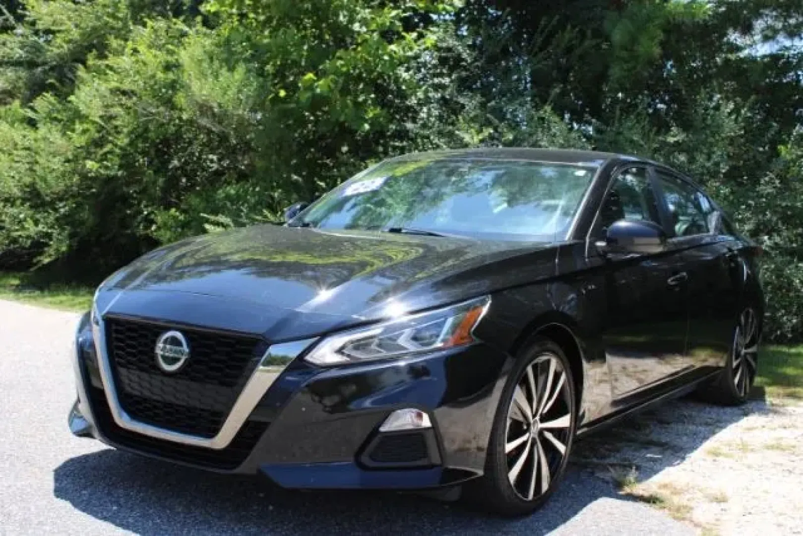2022 Nissan Altima SR FWD (1N4BL4CV1NN) with an 2.5L I-4 gasoline direct injection engine, located at 3598 James B White Hwy South, Whiteville, NC, 28472, (910) 642-3196, 34.294846, -78.732613 - ### Drive Your Lifestyle Forward with This 2022 Nissan Altima SR FWD<br /> <br /> If you're looking for **affordable used cars** that seamlessly blend style, comfort, and reliability, look no further than this stunning 2022 Nissan Altima SR FWD, now available at Car City - Whitesville. Located conve - Photo#0