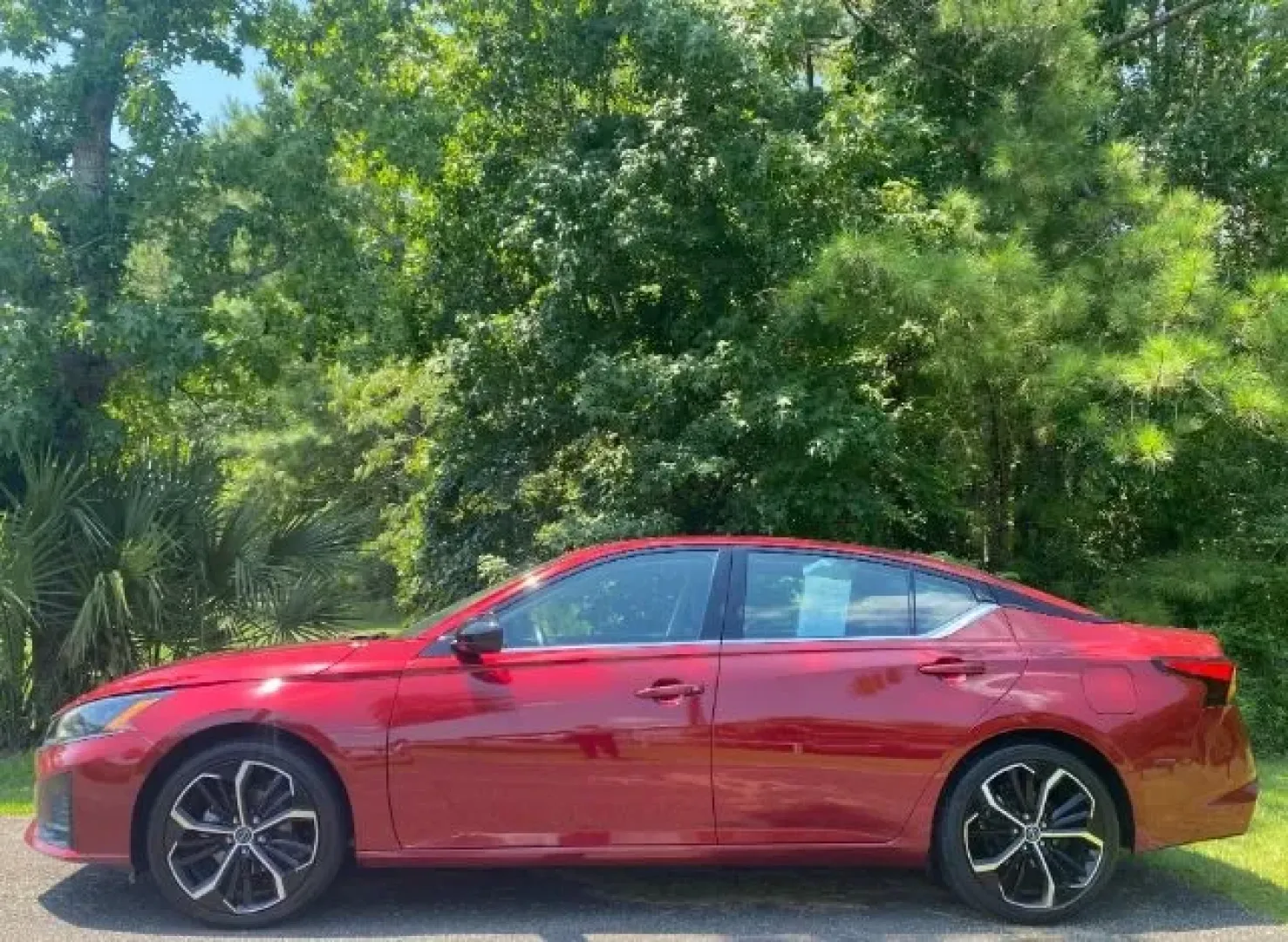 2023 /Sport Nissan Altima SR FWD (1N4BL4CV5PN) with an 2.5L I-4 gasoline direct injection engine, located at 9146 Ocean Hwy West, Calabash, NC, 28467, (910) 579-1110, 33.928635, -78.576157 - **Elevate Your Daily Drive with the 2023 Nissan Altima SR FWD in Scarlet Ember Tintcoat!**<br /> <br /> Are you on the hunt for a perfect blend of style, comfort, and technology for your daily commute? Look no further! This stunning 2023 Nissan Altima SR FWD, available at Car City - Calabash, is des - Photo#1