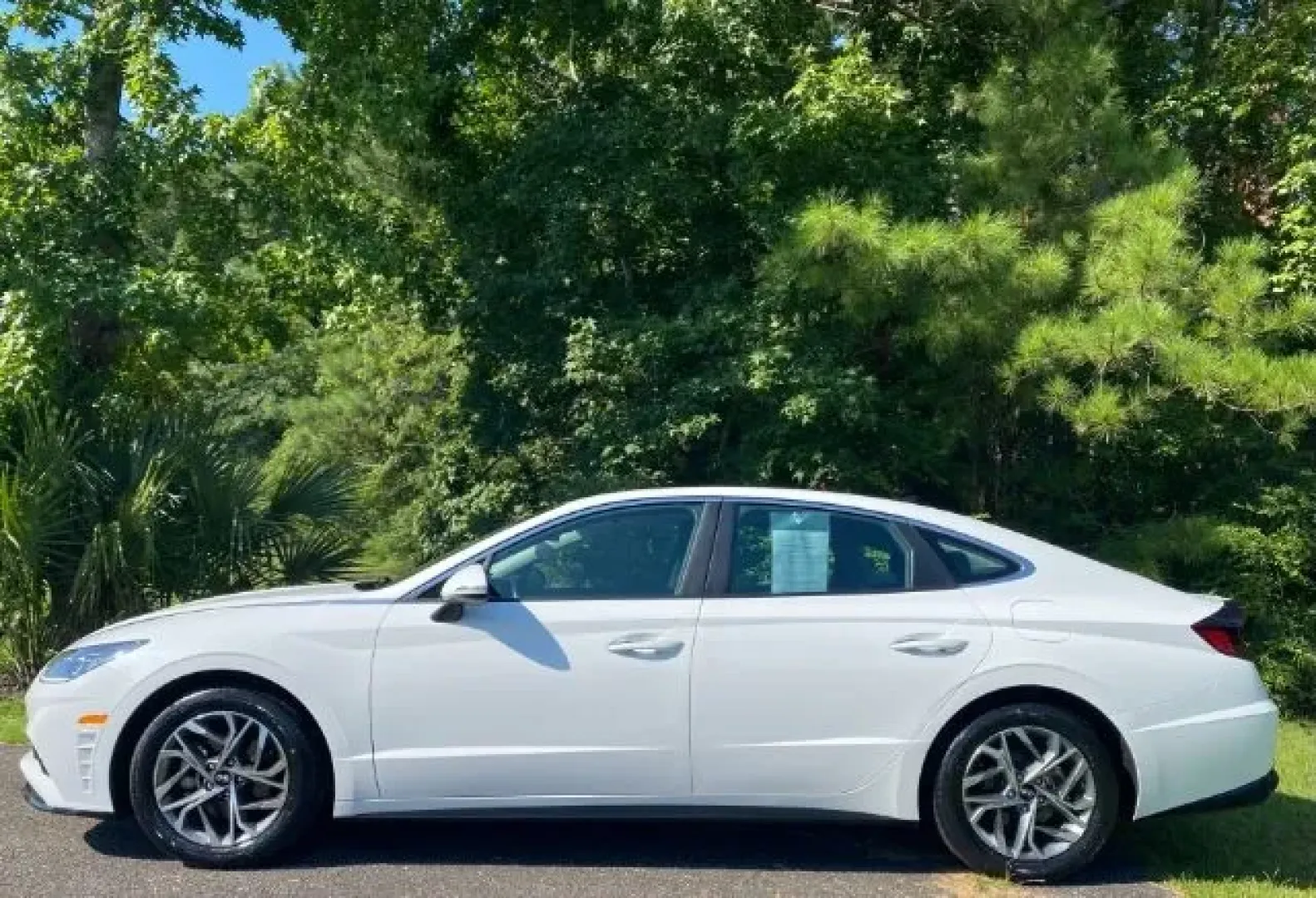 2023 /Black Hyundai Sonata SEL (KMHL14JA1PA) with an Smartstream 2.5L I-4 port/direct injection engine, located at 9146 Ocean Hwy West, Calabash, NC, 28467, (910) 579-1110, 33.928635, -78.576157 - **Drive in Style and Comfort: 2023 Hyundai Sonata SEL at Car City - Calabash!**<br /> <br /> Are you ready to elevate your daily commute or weekend adventures? The stunning 2023 Hyundai Sonata SEL, available now at Car City - Calabash, is the perfect blend of sophistication, performance, and comfort - Photo#1