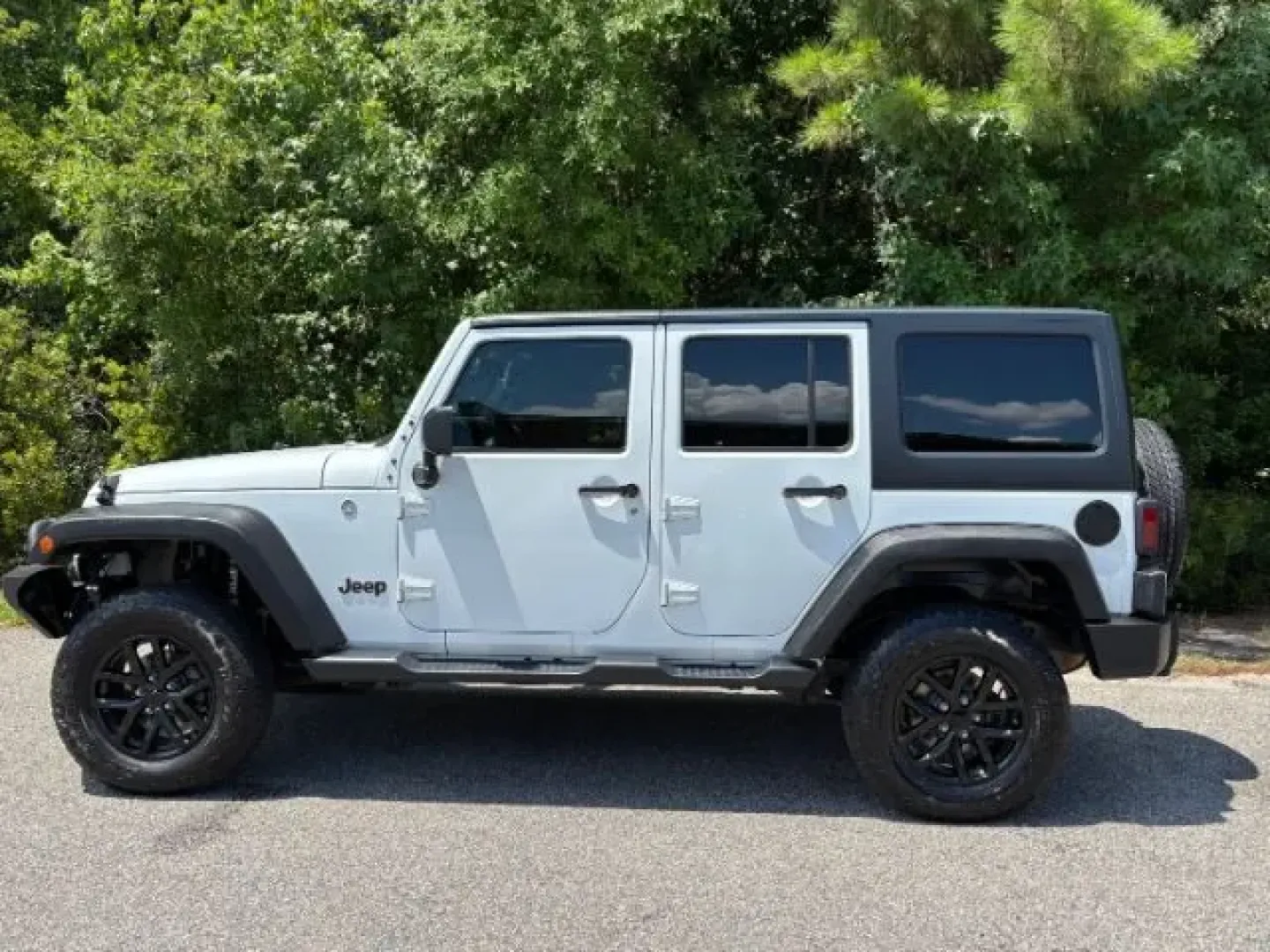 2016 /Black Jeep Wrangler Sport (1C4BJWDG9GL) with an Pentastar 3.6L V-6 DOHC engine, located at 9146 Ocean Hwy West, Calabash, NC, 28467, (910) 579-1110, 33.928635, -78.576157 - **Adventure Awaits with the 2016 Jeep Wrangler Sport - Your Perfect Companion for Life's Journeys!**<br /> <br /> Are you ready for thrilling weekend adventures or daily excursions in a vehicle that combines rugged capability with modern comfort? Look no further than this 2016 Jeep Wrangler Sport, a - Photo#2