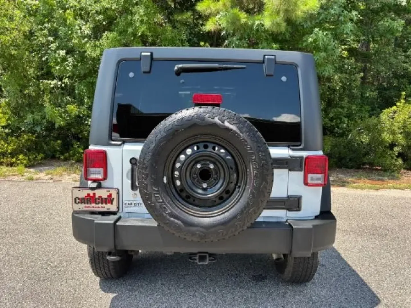 2016 /Black Jeep Wrangler Sport (1C4BJWDG9GL) with an Pentastar 3.6L V-6 DOHC engine, located at 9146 Ocean Hwy West, Calabash, NC, 28467, (910) 579-1110, 33.928635, -78.576157 - **Adventure Awaits with the 2016 Jeep Wrangler Sport - Your Perfect Companion for Life's Journeys!**<br /> <br /> Are you ready for thrilling weekend adventures or daily excursions in a vehicle that combines rugged capability with modern comfort? Look no further than this 2016 Jeep Wrangler Sport, a - Photo#5