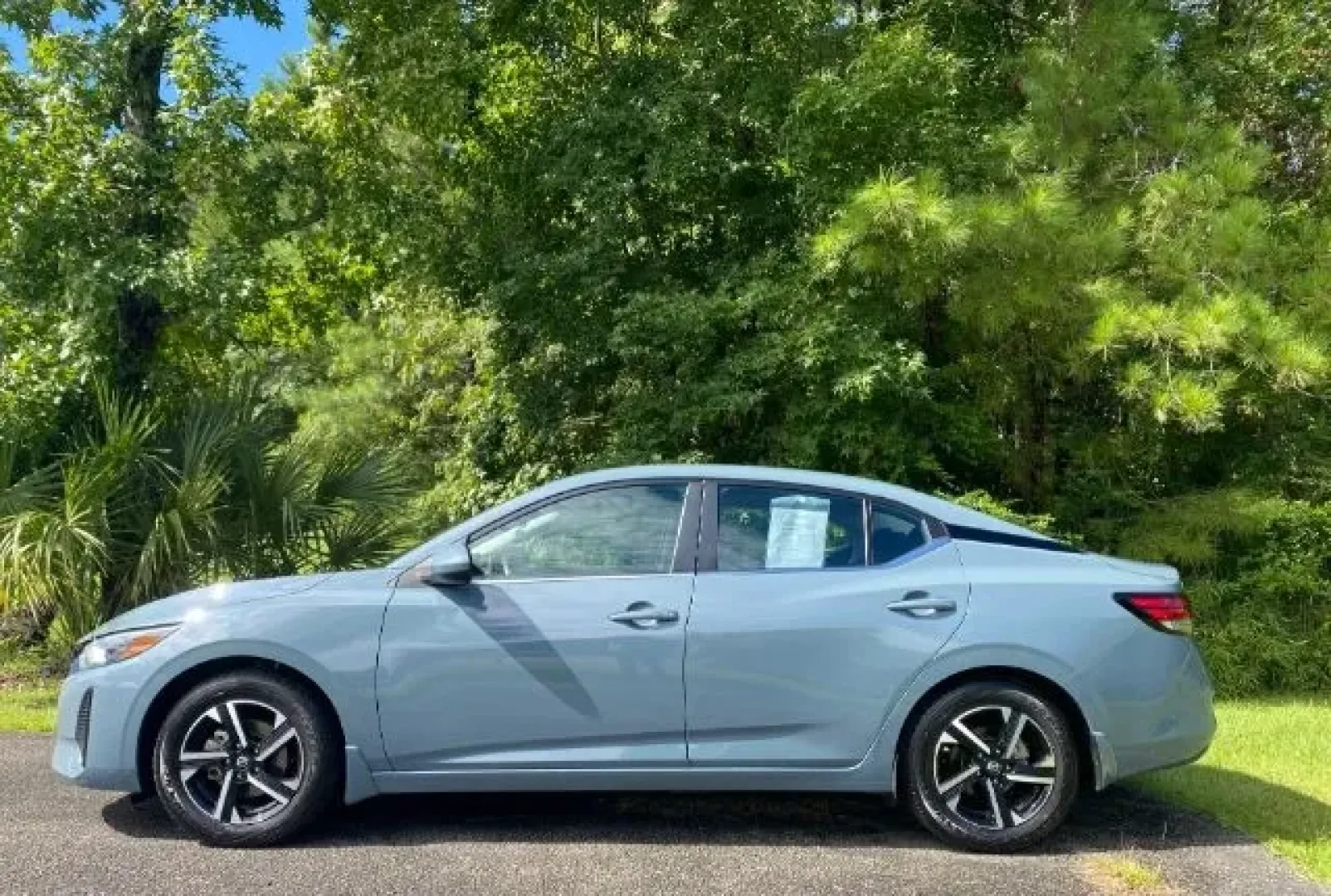 2024 /Charcoal Nissan Sentra SV Xtronic CVT (3N1AB8CV7RY) with an 2L I-4 gasoline direct injection engine, located at 9146 Ocean Hwy West, Calabash, NC, 28467, (910) 579-1110, 33.928635, -78.576157 - Are you ready to elevate your daily commute or weekend adventures? The 2024 Nissan Sentra SV Xtronic CVT is your perfect companion, blending style, comfort, and efficiency in one luxurious package. This sedan is ideal for anyone who seeks a reliable vehicle without compromising on modern tech featur - Photo#1