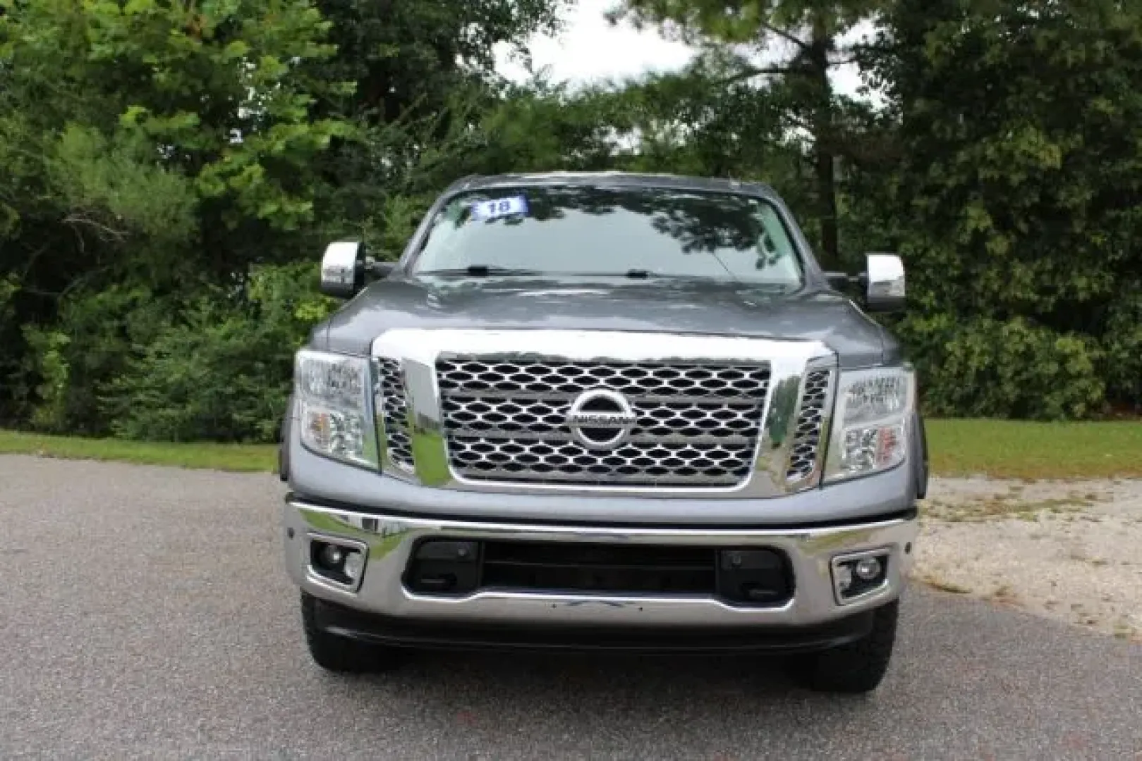 2018 Nissan TITAN SV (1N6AA1E56JN) with an Endurance 5.6L V-8 gasoline direct injection engine, located at 3598 James B White Hwy South, Whiteville, NC, 28472, (910) 642-3196, 34.294846, -78.732613 - **Unleash Your Adventure with the 2018 Nissan TITAN SV Crew Cab at Car City - Whitesville!**<br /> <br /> Are you ready for your next adventure? Whether you're hauling equipment for a weekend project, hitting the open road for a camping trip, or just need a reliable truck for daily errands, our 2018 - Photo#1