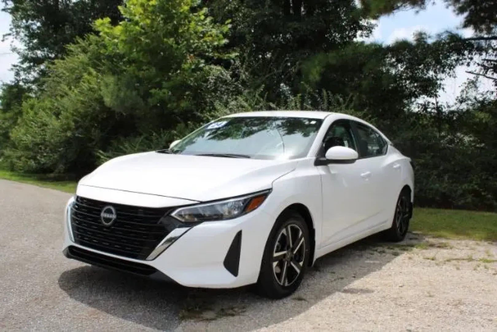 2024 Nissan Sentra SV Xtronic CVT (3N1AB8CV5RY) with an 2L I-4 gasoline direct injection engine, located at 3598 James B White Hwy South, Whiteville, NC, 28472, (910) 642-3196, 34.294846, -78.732613 - Experience the pinnacle of modern driving with this stunning 2024 Nissan Sentra SV, proudly offered by Car City - Whitesville. Perfectly tailored for urban commuters and adventurers alike, this pre-owned sedan provides the ideal blend of comfort, efficiency, and style, making it a top choice among a - Photo#0