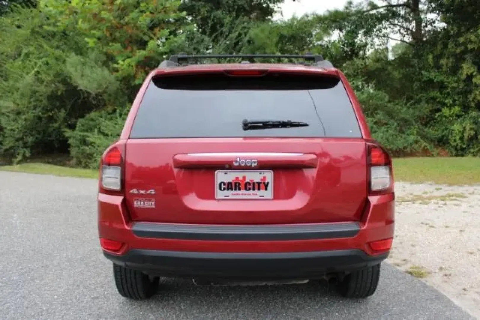 2016 /Dark Slate Gray, pre Jeep Compass Sport 4WD (1C4NJDBB5GD) with an 2.4L L4 DOHC 16V engine, located at 3598 James B White Hwy South, Whiteville, NC, 28472, (910) 642-3196, 34.294846, -78.732613 - **Experience Adventure with This 2016 Jeep Compass Sport 4WD at Car City - Conway!**<br /> <br /> Are you a weekend warrior searching for the perfect SUV to accompany you on your outdoor adventures? Look no further than this exceptional 2016 Jeep Compass Sport 4WD available at Car City - Conway. Thi - Photo#2