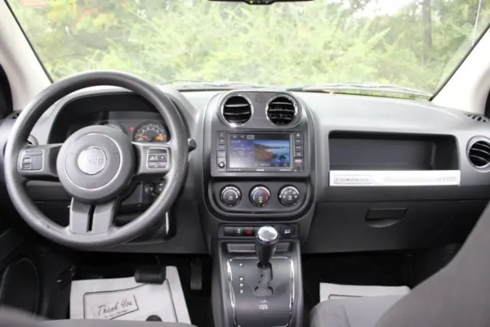 2016 /Dark Slate Gray, pre Jeep Compass Sport 4WD (1C4NJDBB5GD) with an 2.4L L4 DOHC 16V engine, located at 3598 James B White Hwy South, Whiteville, NC, 28472, (910) 642-3196, 34.294846, -78.732613 - **Experience Adventure with This 2016 Jeep Compass Sport 4WD at Car City - Conway!**<br /> <br /> Are you a weekend warrior searching for the perfect SUV to accompany you on your outdoor adventures? Look no further than this exceptional 2016 Jeep Compass Sport 4WD available at Car City - Conway. Thi - Photo#6