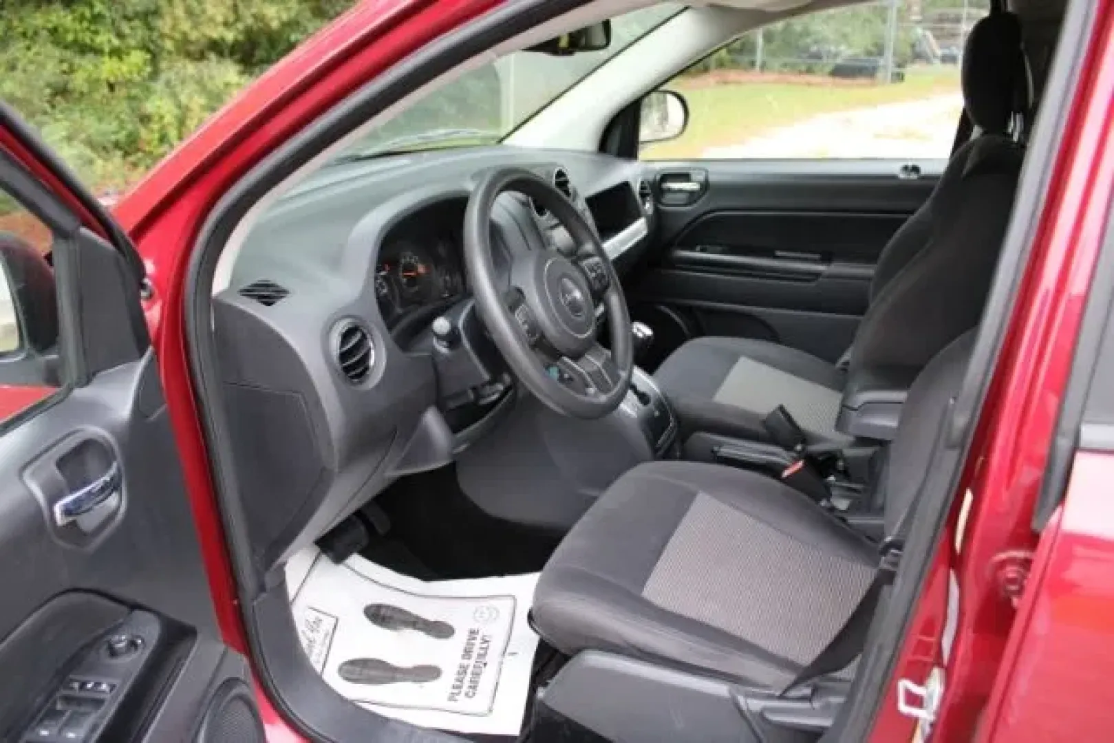 2016 /Dark Slate Gray, pre Jeep Compass Sport 4WD (1C4NJDBB5GD) with an 2.4L L4 DOHC 16V engine, located at 3598 James B White Hwy South, Whiteville, NC, 28472, (910) 642-3196, 34.294846, -78.732613 - **Experience Adventure with This 2016 Jeep Compass Sport 4WD at Car City - Conway!**<br /> <br /> Are you a weekend warrior searching for the perfect SUV to accompany you on your outdoor adventures? Look no further than this exceptional 2016 Jeep Compass Sport 4WD available at Car City - Conway. Thi - Photo#7
