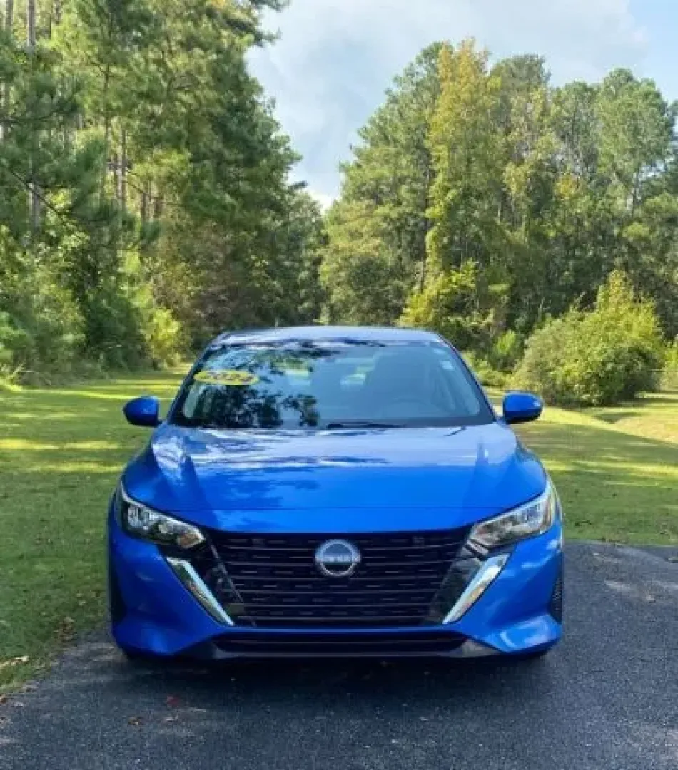 2024 /Charcoal Nissan Sentra SV Xtronic CVT (3N1AB8CV2RY) with an 2L I-4 gasoline direct injection engine, located at 9146 Ocean Hwy West, Calabash, NC, 28467, (910) 579-1110, 33.928635, -78.576157 - **Discover Your Next Adventure with the 2024 Nissan Sentra SV in Electric Blue Metallic!**<br /> <br /> Imagine tackling your daily commute with style and comfort, or embarking on weekend adventures with friends or family. The 2024 Nissan Sentra SV Xtronic CVT is not just any sedan; it's an embodime - Photo#1