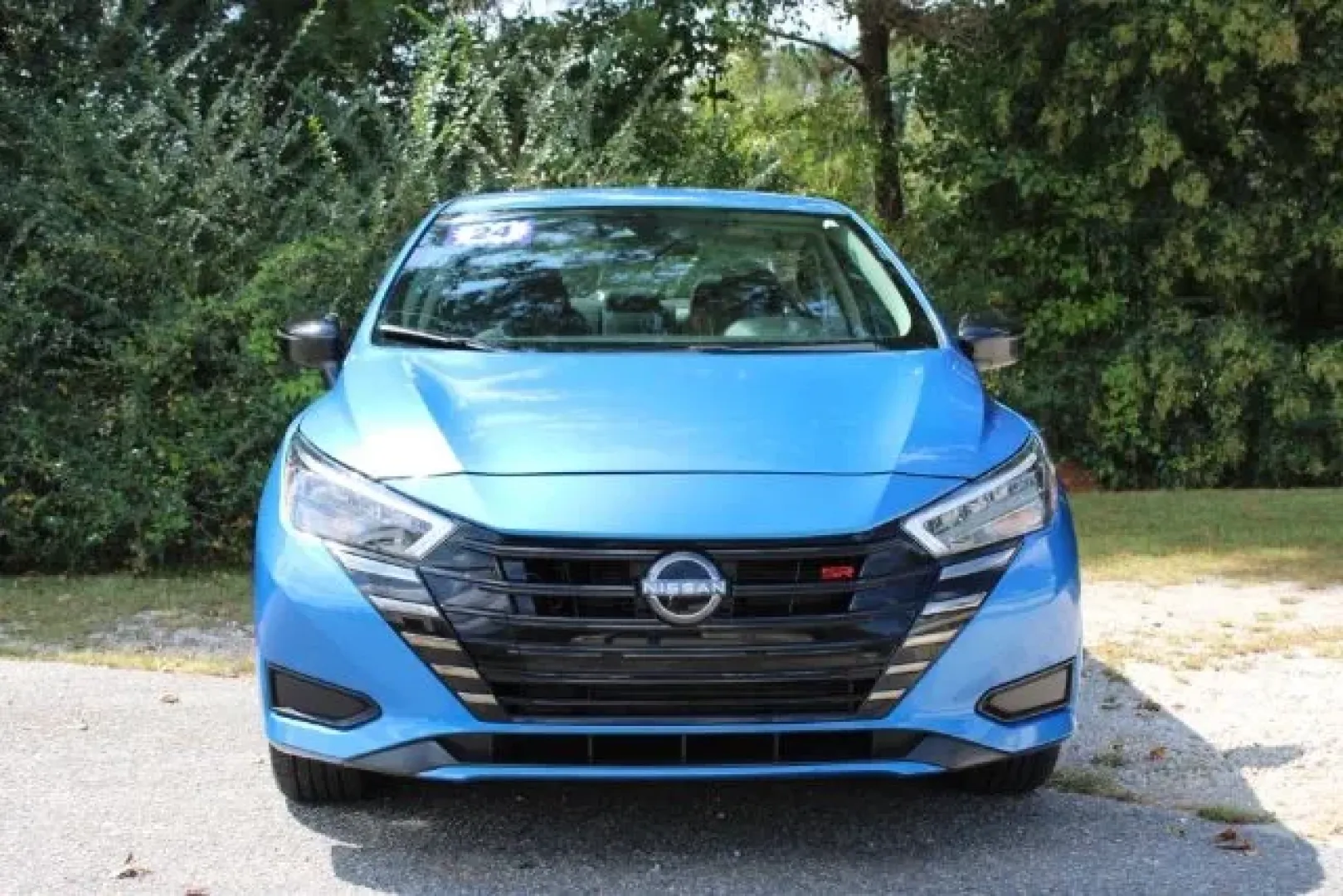 2024 /Sport Nissan Versa 1.6 SR (3N1CN8FV9RL) with an 1.6L I-4 DOHC engine, located at 3598 James B White Hwy South, Whiteville, NC, 28472, (910) 642-3196, 34.294846, -78.732613 - Experience the thrill of the open road with the 2024 Nissan Versa, a stylish and versatile sedan that perfectly balances comfort and performance. Ideal for budget-conscious buyers and growing families alike, this pre-owned vehicle brings you reliability and efficiency for all your daily adventures. - Photo#1