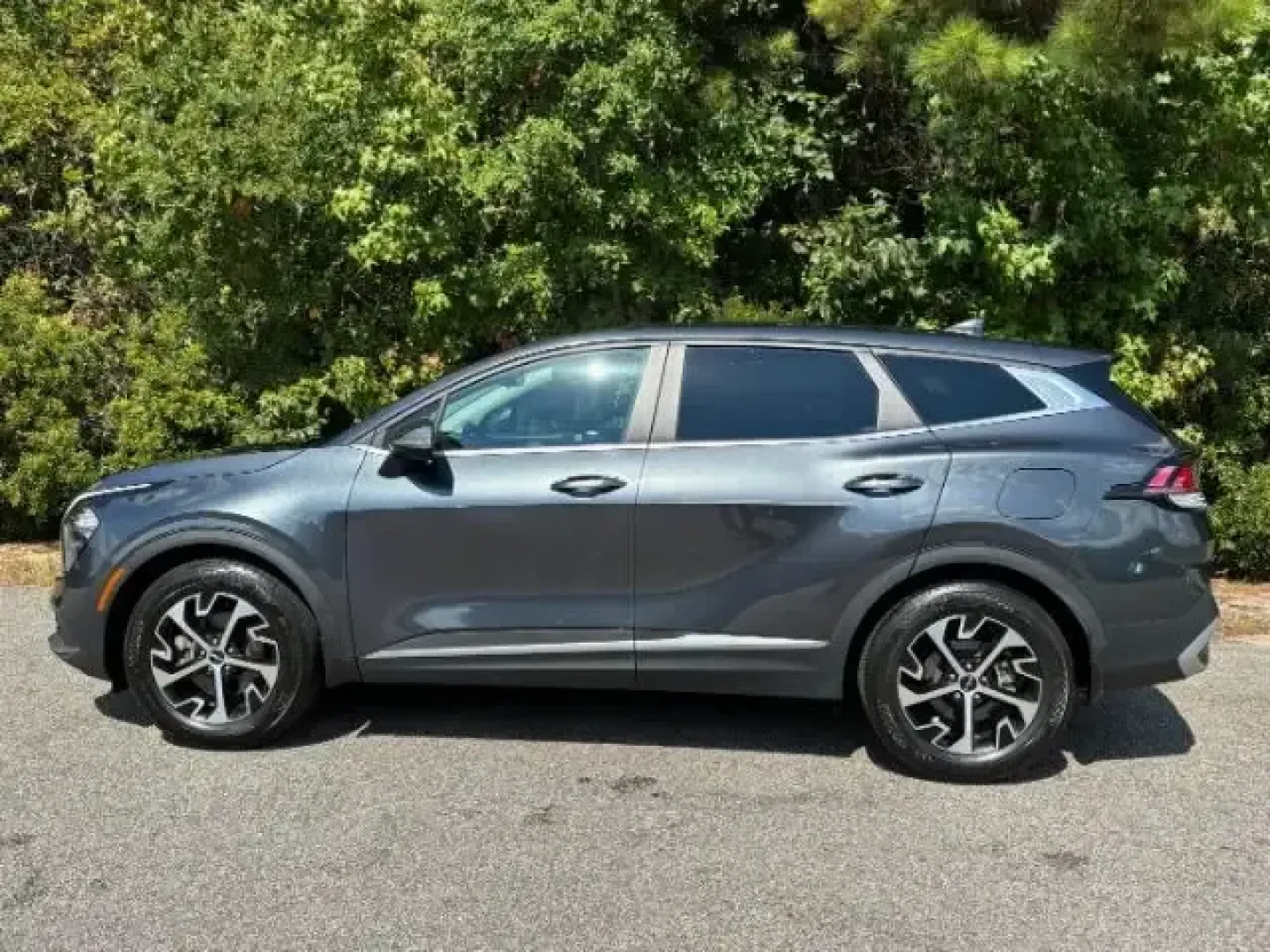 2023 /Black Kia Sportage EX (5XYK33AF6PG) with an 2.5L I-4 port/direct injection engine, 6A transmission, located at 9146 Ocean Hwy West, Calabash, NC, 28467, (910) 579-1110, 33.928635, -78.576157 - ### Embrace Adventure with the 2023 Kia Sportage EX at Car City - Conway!<br /> <br /> Are you ready to elevate your daily commute and weekend adventures? Look no further than the 2023 Kia Sportage EX, available now at Car City - Conway! This stylish and reliable crossover is designed to accommodate - Photo#2