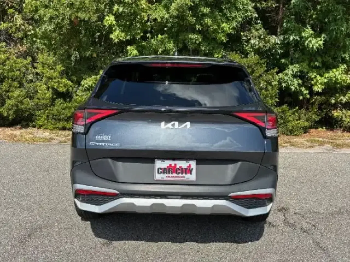 2023 /Black Kia Sportage EX (5XYK33AF6PG) with an 2.5L I-4 port/direct injection engine, 6A transmission, located at 9146 Ocean Hwy West, Calabash, NC, 28467, (910) 579-1110, 33.928635, -78.576157 - ### Embrace Adventure with the 2023 Kia Sportage EX at Car City - Conway!<br /> <br /> Are you ready to elevate your daily commute and weekend adventures? Look no further than the 2023 Kia Sportage EX, available now at Car City - Conway! This stylish and reliable crossover is designed to accommodate - Photo#5