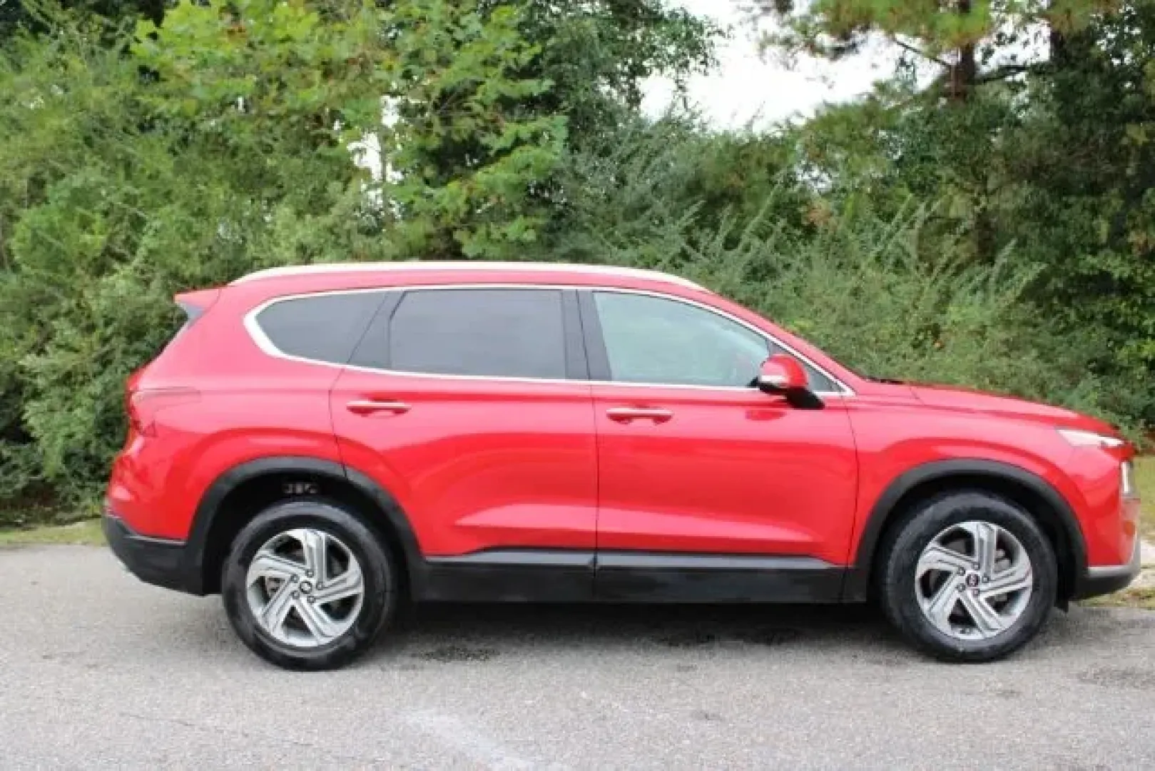 2023 /Black Hyundai Santa Fe SEL (5NMS24AJ8PH) with an Smartstream 2.5L I-4 port/direct injection engine, located at 3598 James B White Hwy South, Whiteville, NC, 28472, (910) 642-3196, 34.294846, -78.732613 - **Discover Adventure and Comfort in the 2023 Hyundai Santa Fe SEL at Car City - Whitesville!**<br /> <br /> Are you ready to elevate your family outings or weekend adventures? Look no further than this striking **2023 Hyundai Santa Fe SEL**, a vehicle designed for those who crave a blend of style, c - Photo#2