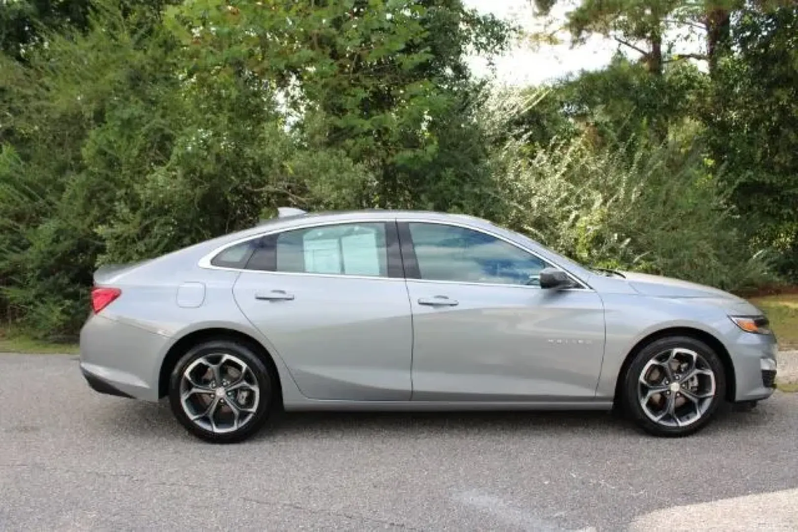2023 /Jet Black Chevrolet Malibu FWD 1LT (1G1ZD5ST9PF) with an ECOTEC 1.5L I-4 gasoline direct injection engine, located at 3598 James B White Hwy South, Whiteville, NC, 28472, (910) 642-3196, 34.294846, -78.732613 - **Ride in Comfort with the 2023 Chevrolet Malibu Perfect for Your Daily Commute and Family Adventures!**<br /> <br /> If you're looking for a versatile vehicle that perfectly balances style, comfort, and practicality, look no further than the 2023 Chevrolet Malibu available at Car City - Whitesvill - Photo#3