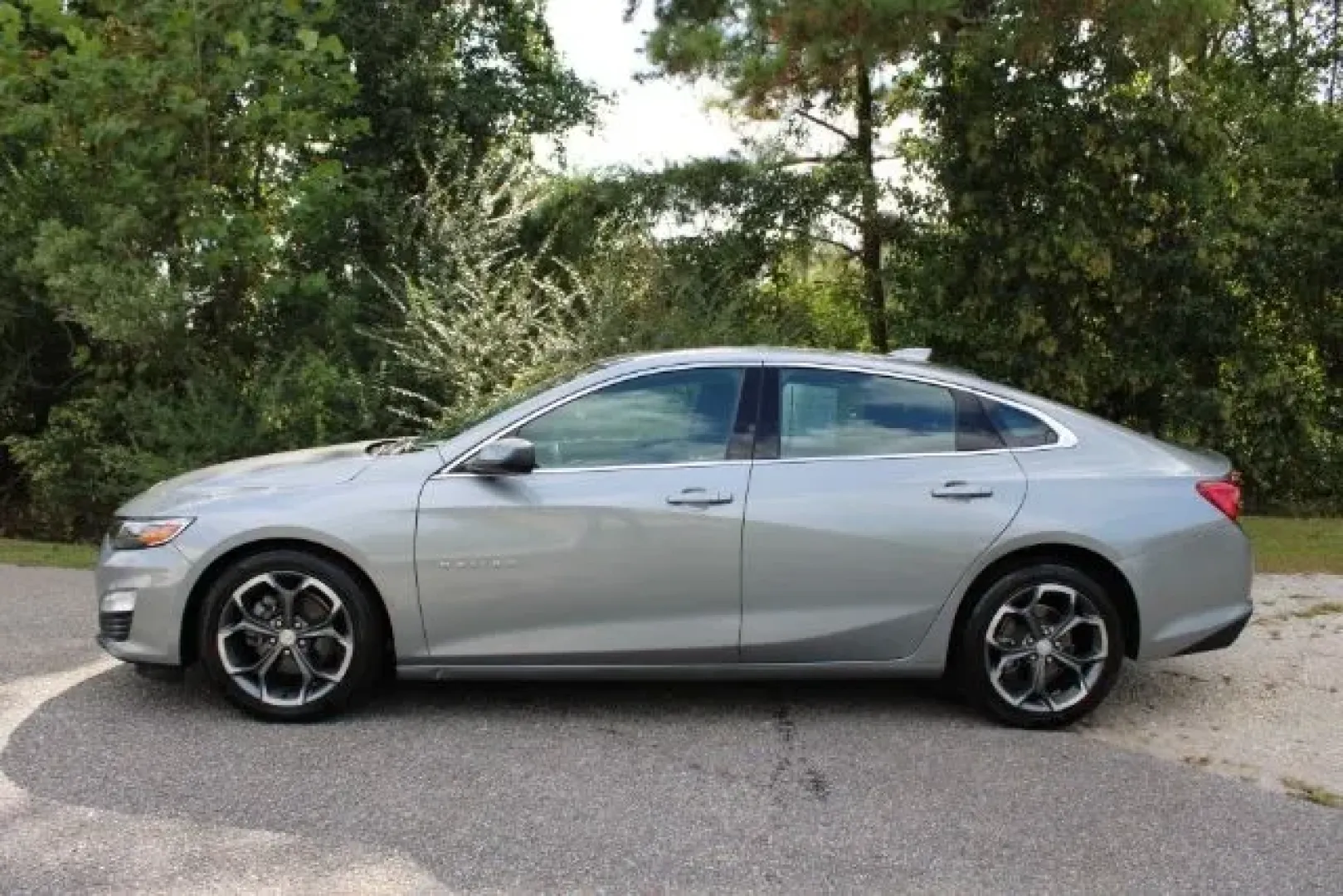 2023 /Jet Black Chevrolet Malibu FWD 1LT (1G1ZD5ST9PF) with an ECOTEC 1.5L I-4 gasoline direct injection engine, located at 3598 James B White Hwy South, Whiteville, NC, 28472, (910) 642-3196, 34.294846, -78.732613 - **Ride in Comfort with the 2023 Chevrolet Malibu Perfect for Your Daily Commute and Family Adventures!**<br /> <br /> If you're looking for a versatile vehicle that perfectly balances style, comfort, and practicality, look no further than the 2023 Chevrolet Malibu available at Car City - Whitesvill - Photo#4