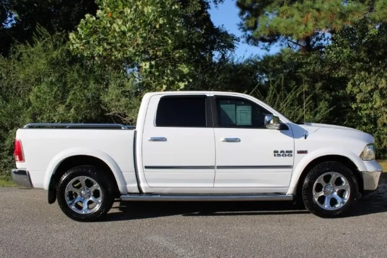 2017 Ram 1500 Laramie Crew Cab 4x2 5'7 Box (1C6RR6NT6HS) with an Other engine, located at 3598 James B White Hwy South, Whiteville, NC, 28472, (910) 642-3196, 34.294846, -78.732613 - Elevate your driving experience and unlock endless adventures with this stunning 2017 Ram 1500 Laramie Crew Cab, an exceptional choice for those seeking a balance of power, comfort, and versatility. If you're looking for a dependable truck that can seamlessly transition from daily commutes to weeken - Photo#4