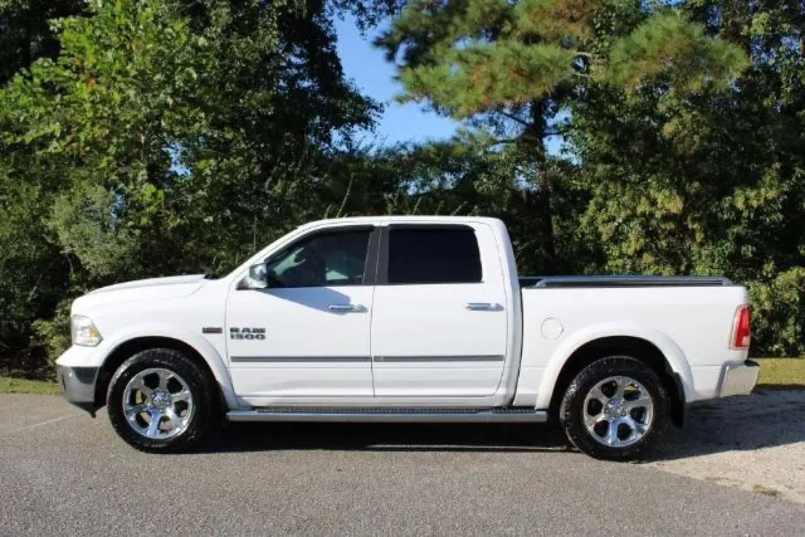 2017 Ram 1500 Laramie Crew Cab 4x2 5'7 Box (1C6RR6NT6HS) with an Other engine, located at 3598 James B White Hwy South, Whiteville, NC, 28472, (910) 642-3196, 34.294846, -78.732613 - Elevate your driving experience and unlock endless adventures with this stunning 2017 Ram 1500 Laramie Crew Cab, an exceptional choice for those seeking a balance of power, comfort, and versatility. If you're looking for a dependable truck that can seamlessly transition from daily commutes to weeken - Photo#5