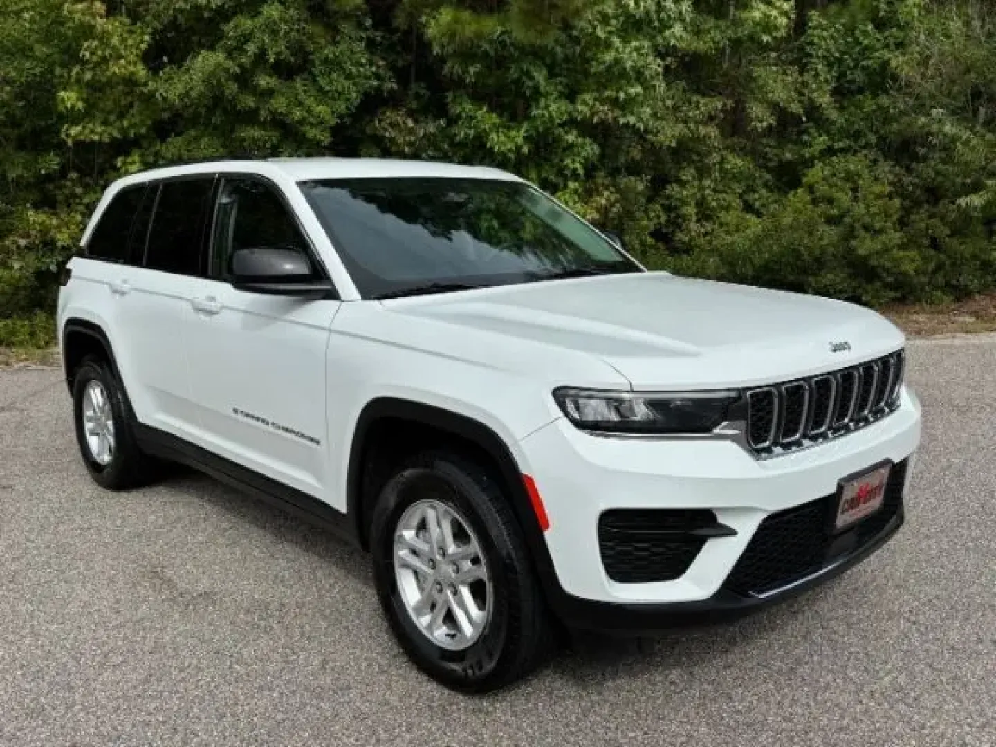 2023 /Global Black Jeep Grand Cherokee Laredo 4x4 (1C4RJHAG6PC) with an Pentastar 3.6L V-6 DOHC engine, located at 3598 James B White Hwy South, Whiteville, NC, 28472, (910) 642-3196, 34.294846, -78.732613 - **Adventure Awaits with the 2023 Jeep Grand Cherokee Laredo 4x4 at Car City - Conway!**<br /> <br /> Are you ready for your next adventure? Whether you're a growing family seeking a reliable SUV for school runs and weekend getaways or an outdoor enthusiast craving a vehicle that can tackle rugged te - Photo#1