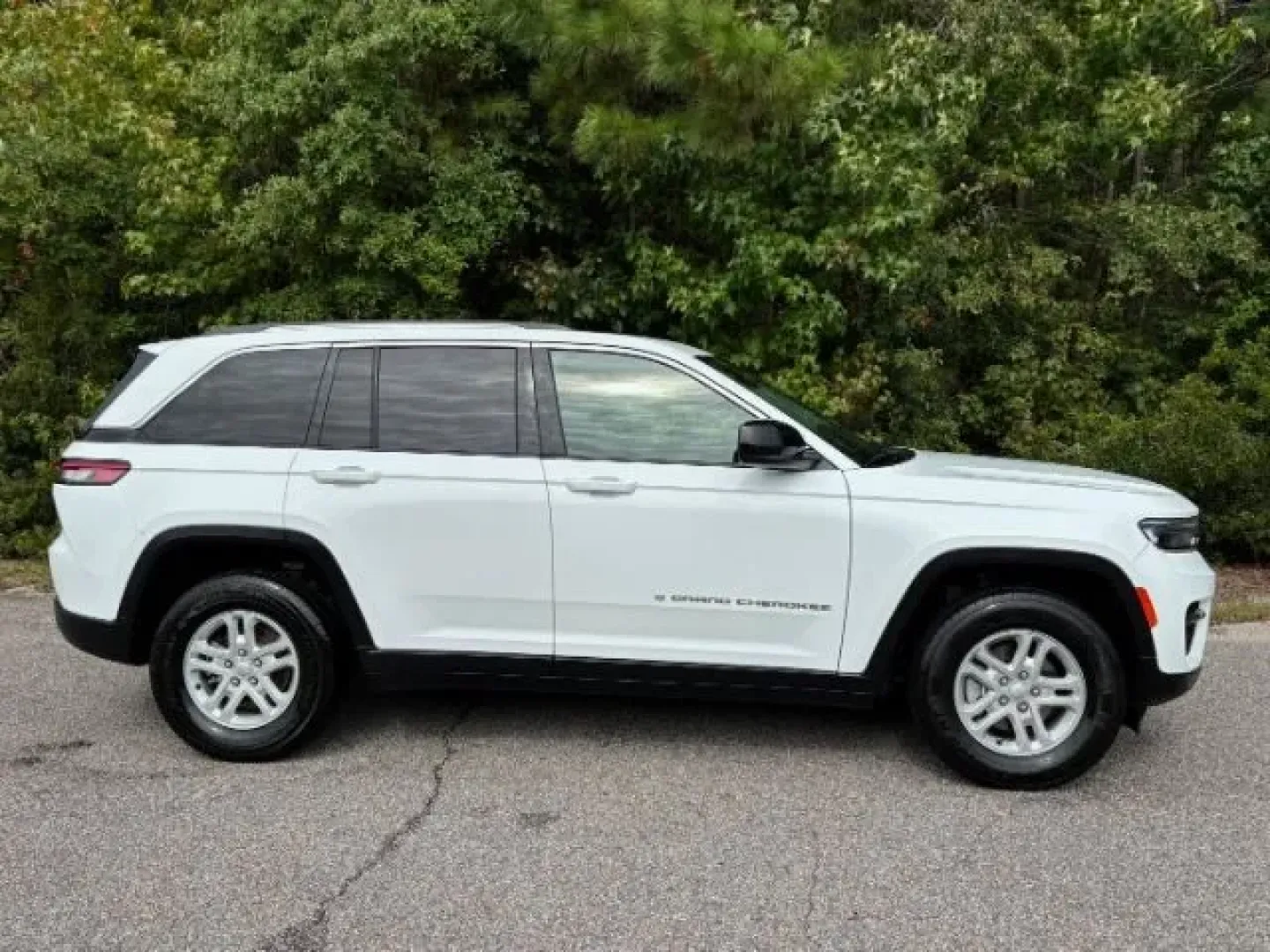 2023 /Global Black Jeep Grand Cherokee Laredo 4x4 (1C4RJHAG6PC) with an Pentastar 3.6L V-6 DOHC engine, located at 3598 James B White Hwy South, Whiteville, NC, 28472, (910) 642-3196, 34.294846, -78.732613 - **Adventure Awaits with the 2023 Jeep Grand Cherokee Laredo 4x4 at Car City - Conway!**<br /> <br /> Are you ready for your next adventure? Whether you're a growing family seeking a reliable SUV for school runs and weekend getaways or an outdoor enthusiast craving a vehicle that can tackle rugged te - Photo#3