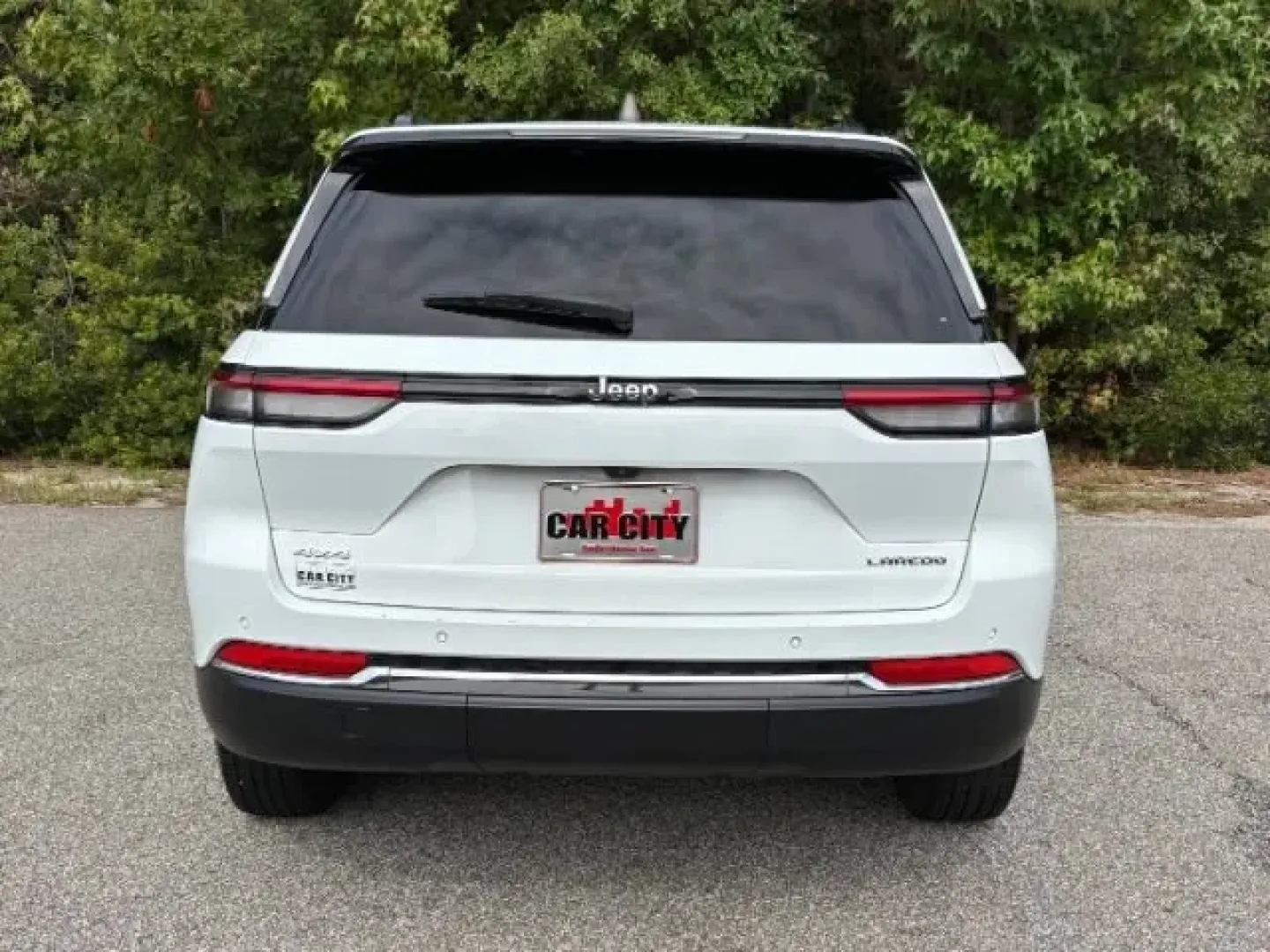 2023 /Global Black Jeep Grand Cherokee Laredo 4x4 (1C4RJHAG6PC) with an Pentastar 3.6L V-6 DOHC engine, located at 3598 James B White Hwy South, Whiteville, NC, 28472, (910) 642-3196, 34.294846, -78.732613 - **Adventure Awaits with the 2023 Jeep Grand Cherokee Laredo 4x4 at Car City - Conway!**<br /> <br /> Are you ready for your next adventure? Whether you're a growing family seeking a reliable SUV for school runs and weekend getaways or an outdoor enthusiast craving a vehicle that can tackle rugged te - Photo#5