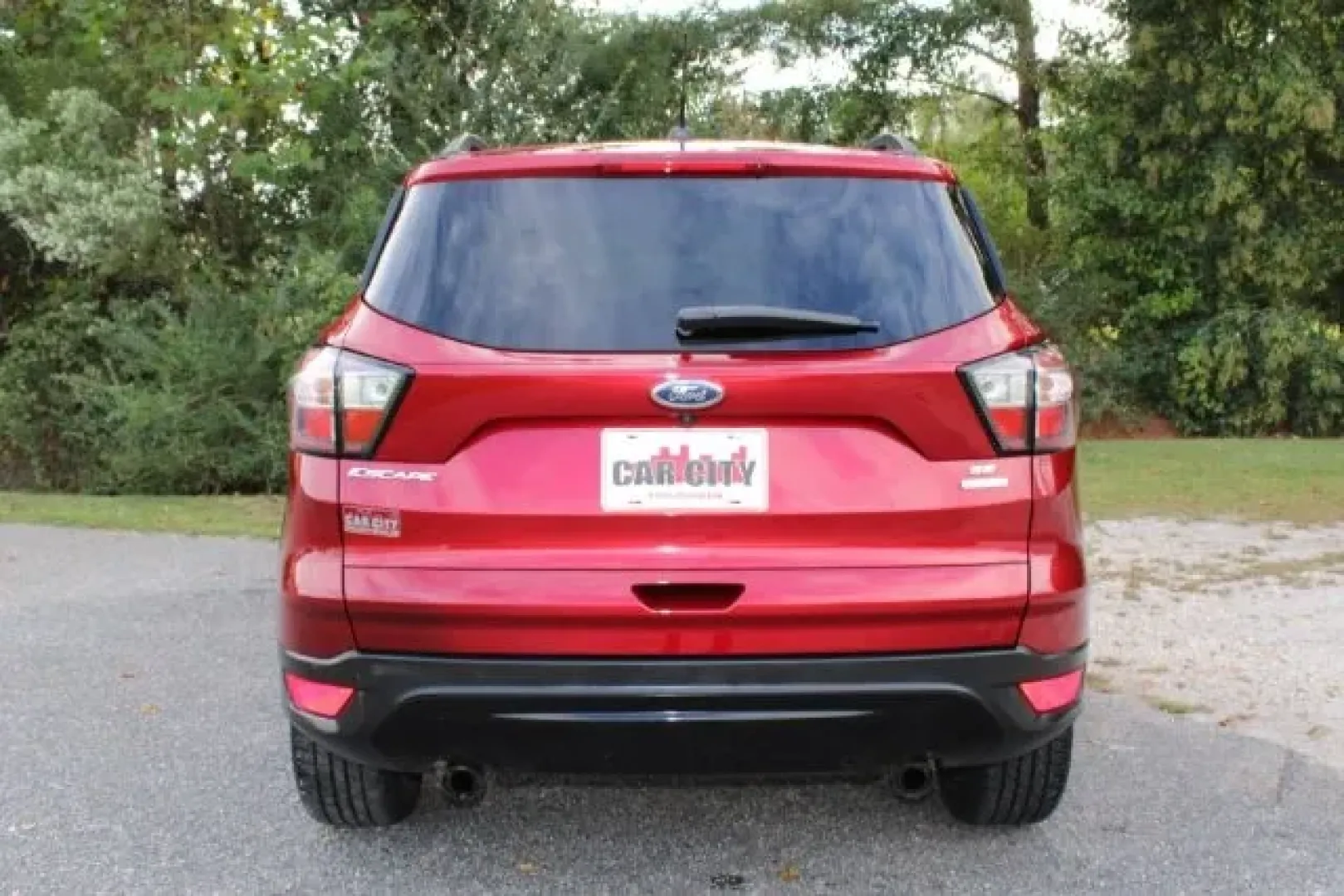 2018 /Charcoal Black Ford Escape SE (1FMCU0GD5JU) with an Other engine, located at 3598 James B White Hwy South, Whiteville, NC, 28472, (910) 642-3196, 34.294846, -78.732613 - **Find Your Adventure with the 2018 Ford Escape SE at Car City - Whitesville**<br /> <br /> Are you in search of the perfect SUV that balances style, comfort, and versatility? Look no further than the 2018 Ford Escape SE, available now at Car City - Whitesville in Whiteville, NC. Whether you're a gr - Photo#2