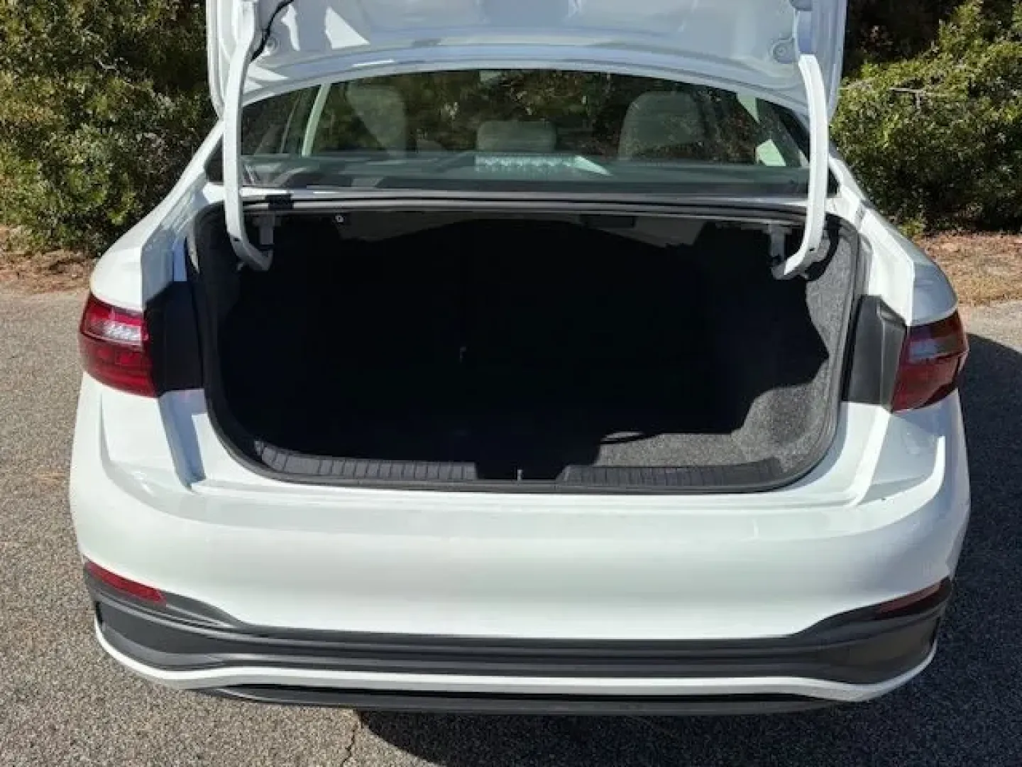 2024 /Titan Black Volkswagen Jetta 1.5T S (3VW5M7BU1RM) with an 1.5L I-4 gasoline direct injection engine, located at 2761 East Hwy 501, Conway, SC, 29526, (843) 331-1151, 33.781528, -78.989883 - Are you searching for a vehicle that perfectly blends style, efficiency, and practicality? Look no further than the 2024 Volkswagen Jetta, an ideal sedan for daily commuters, growing families, and anyone who needs a reliable vehicle for weekend adventures. With its sleek design and technology-driven - Photo#13